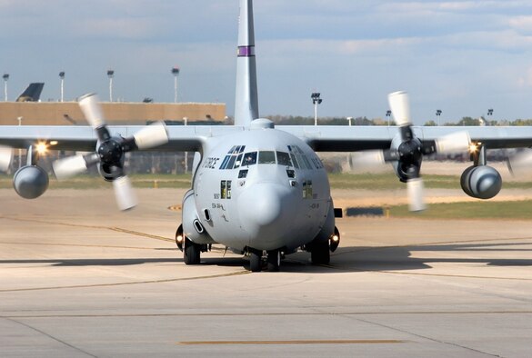 A 934th Airlift Wing "Flying Viking" C-130 taxis away from customs at Minneapolis St. Paul International Airport after returning from a JOINT FORGE mission in Germany.
(Photo by Lt. Col. Gary Chambers)