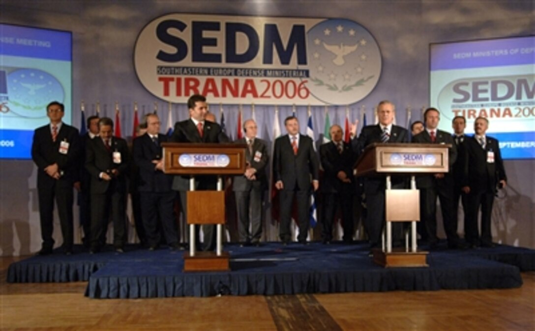Defense Secretary Donald H. Rumsfeld, right, speaks at the Southeastern Europe Defense Ministerial press conference in Tirana, Albania, Sept. 27, 2006. Rumsfeld is visiting Albania to recognize and encourage its continuing efforts to join NATO and to thank its troops for their service in Iraq and Afghanistan.