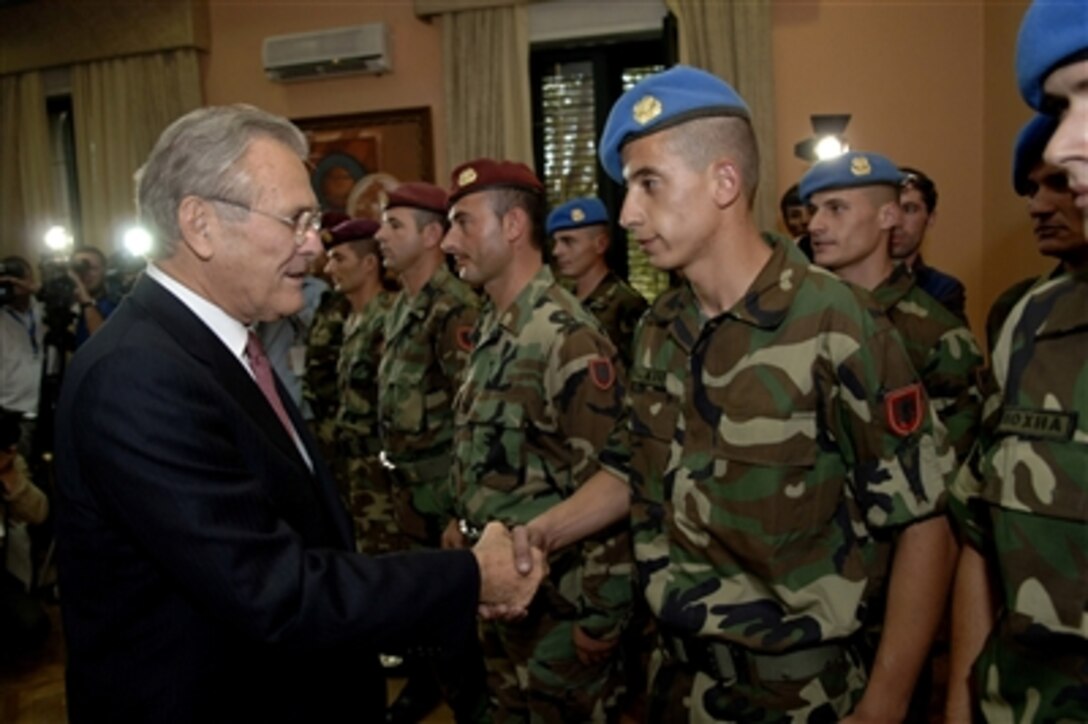 Secretary of Defense Donald H. Rumsfeld congratulates and thanks Albanian soldiers for their performance in Iraq and Afghanistan during his visit to Tirana, Albania, on Sept. 26, 2006.  Rumsfeld is in Albania to attend the South Eastern European Defense Ministerial, and to encourage Albania's continuing efforts to join NATO.  