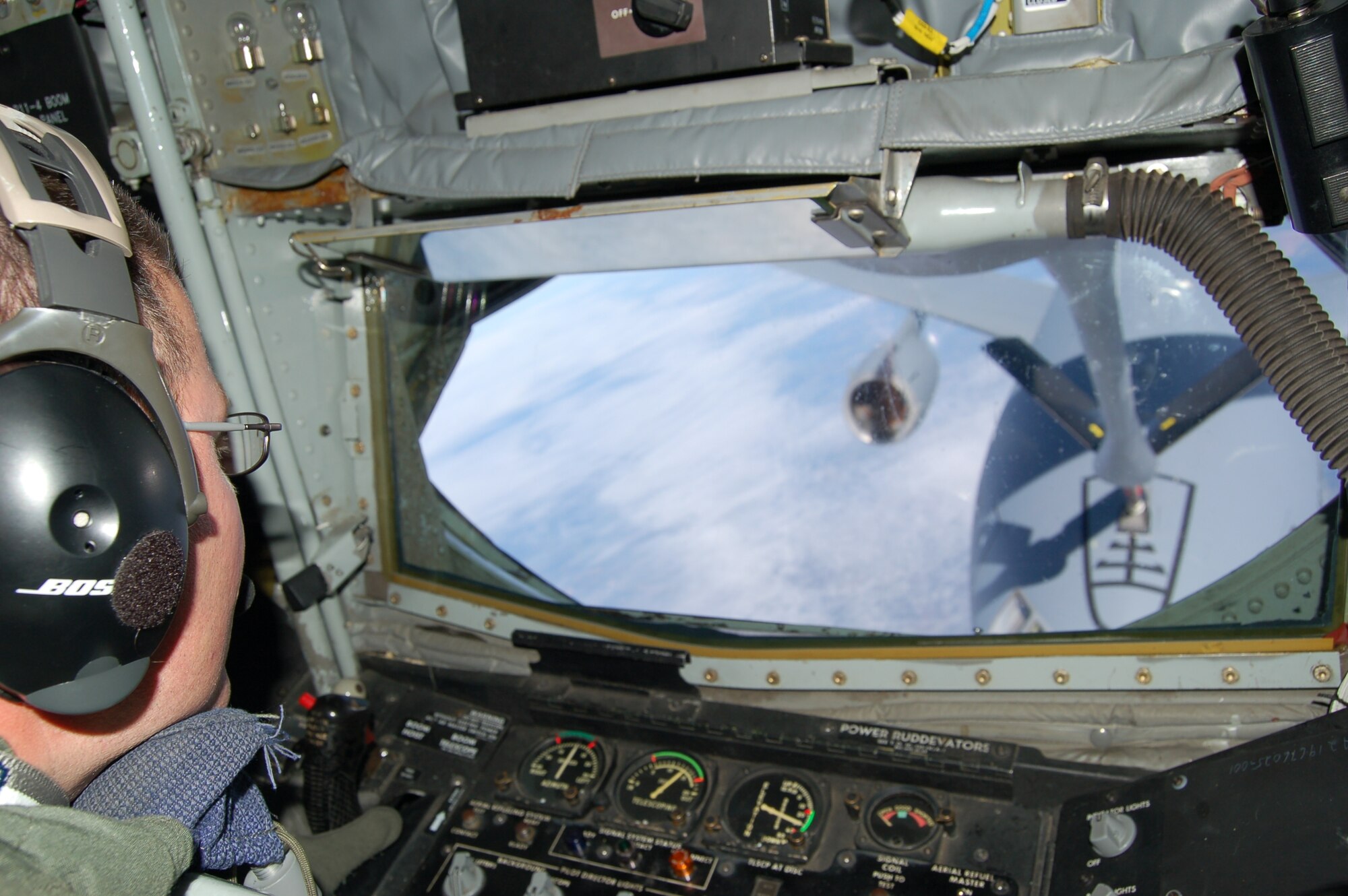 Master Sgt. J.D. Harston, 319th Operations Support Squadron, refuels a KC-10 his brother is piloting. (Photo by Airman 1st Class Ashley Coomes)