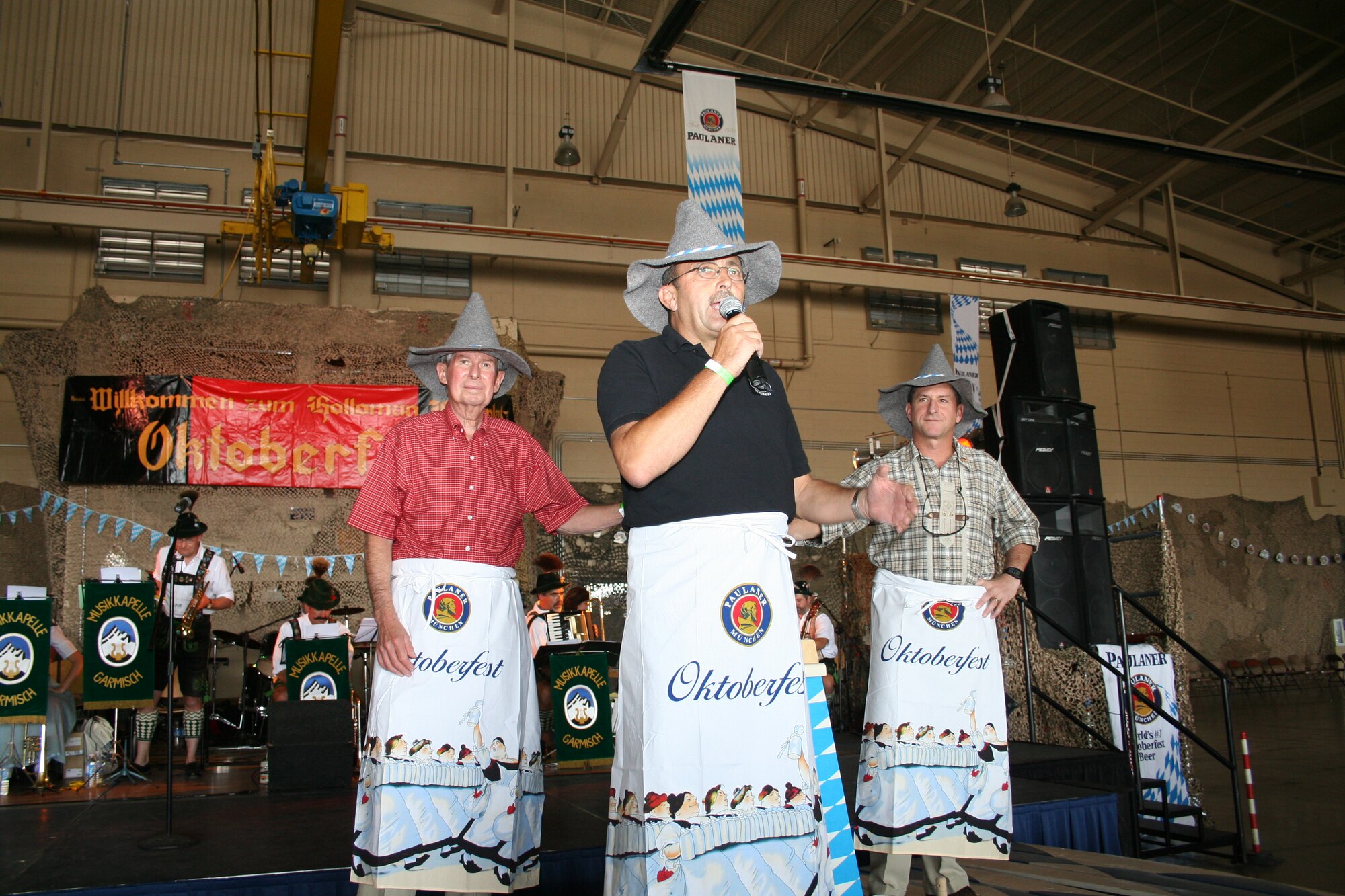 Mr. Don Carrol, mayor of Alamogordo, Col. Manfred Molitor, German air force Flying Training Center commander, and Col. David Goldfein, 49th Fighter Wing commander, rode into Oktoberfest on a platform and tapped a keg to start the event. 