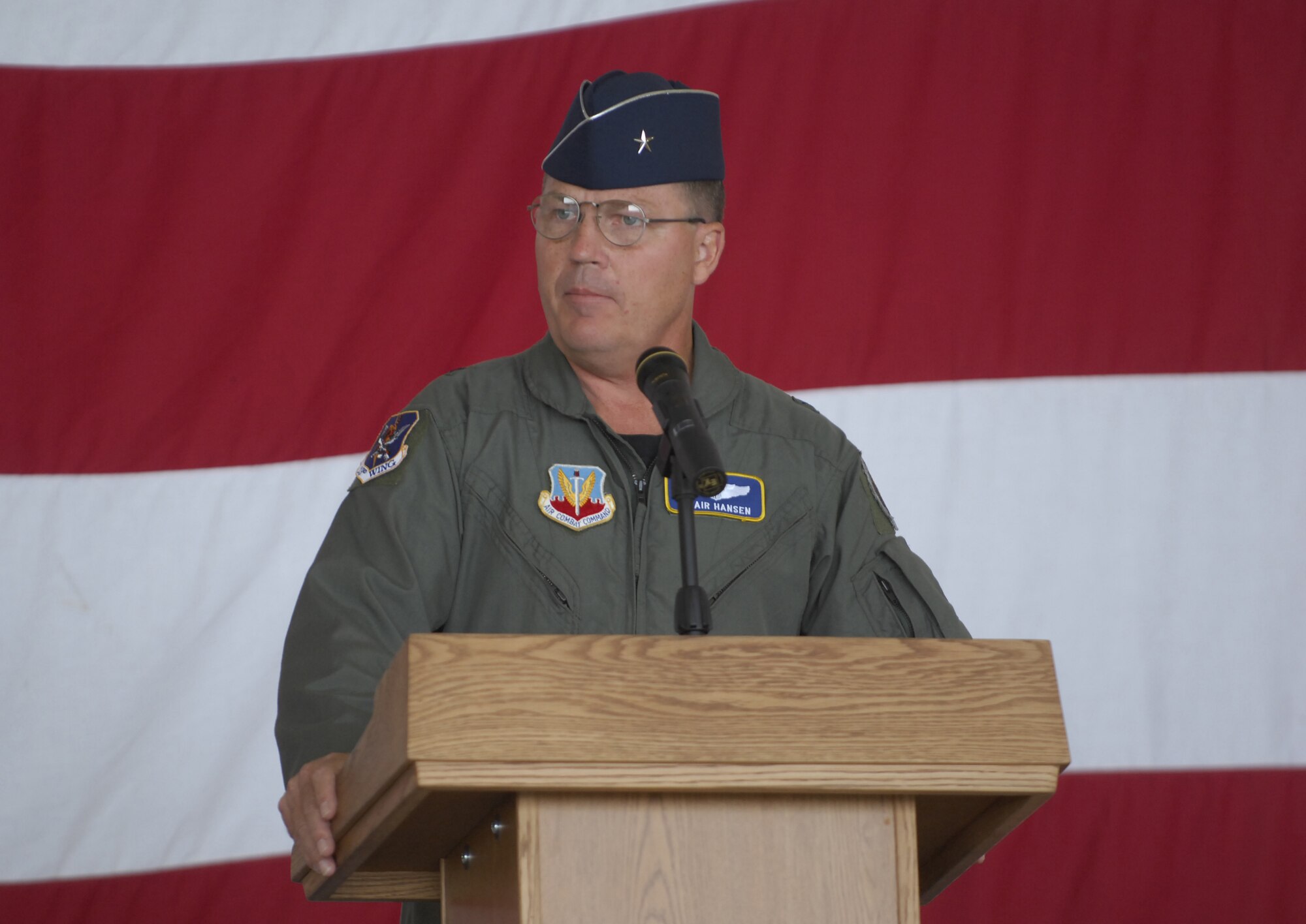 Brig. Gen. Blair Hansen, 9th Air Force vice commander, speaks to the audience about the "Flying Tiger" legacy during the 23rd Wing re-designation ceremony.  General Hansen officiated the ceremony, which culminated a series of changes for the Moody wing. (U.S. Air Force photo by Staff Sgt. Manuel Martinez)