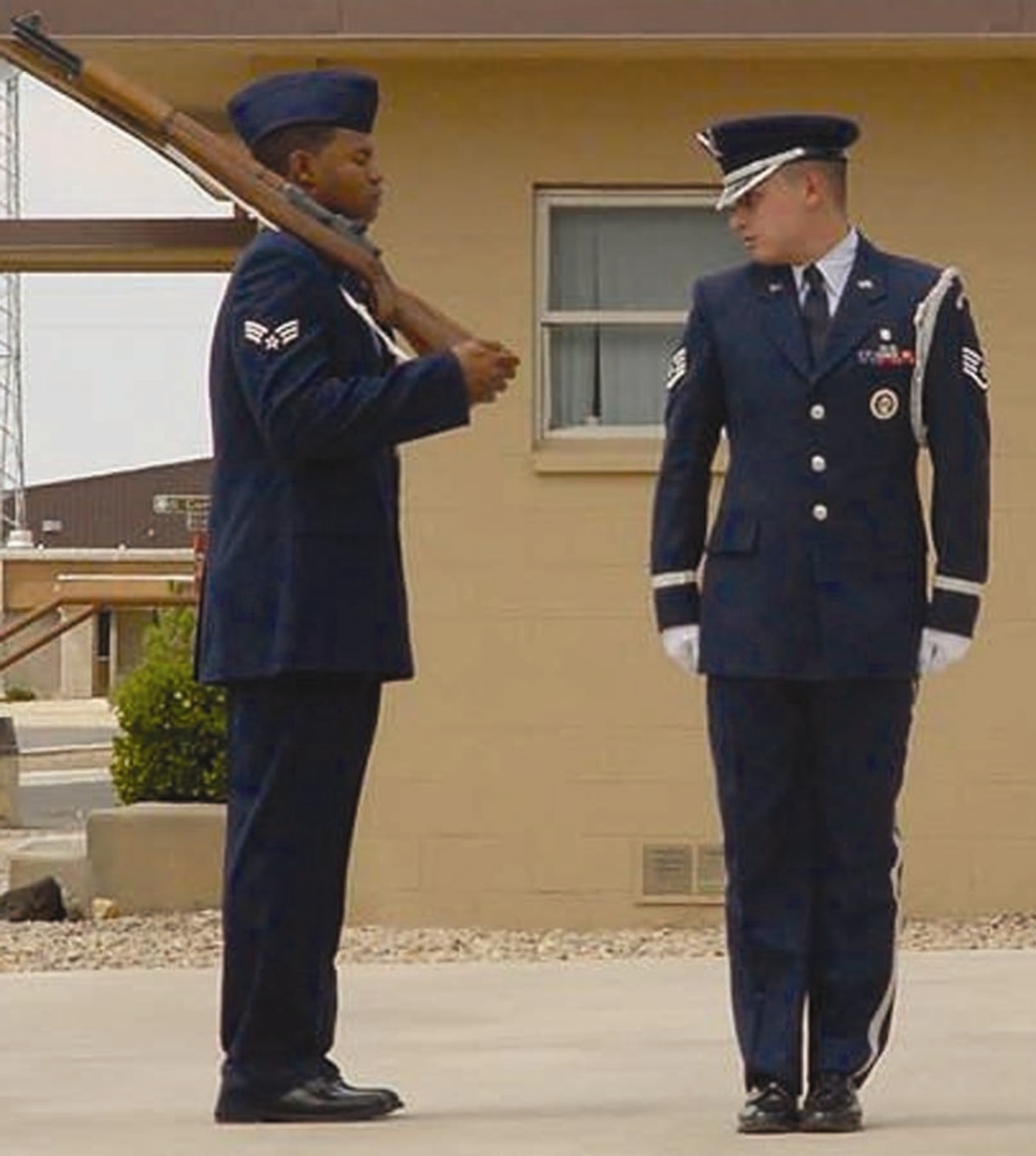 Staff Sgt. Jason Estrada, 49th Medical Support Squadron and Holloman Guardsman, looks to the right at another Guardsman during a graduation sequence.