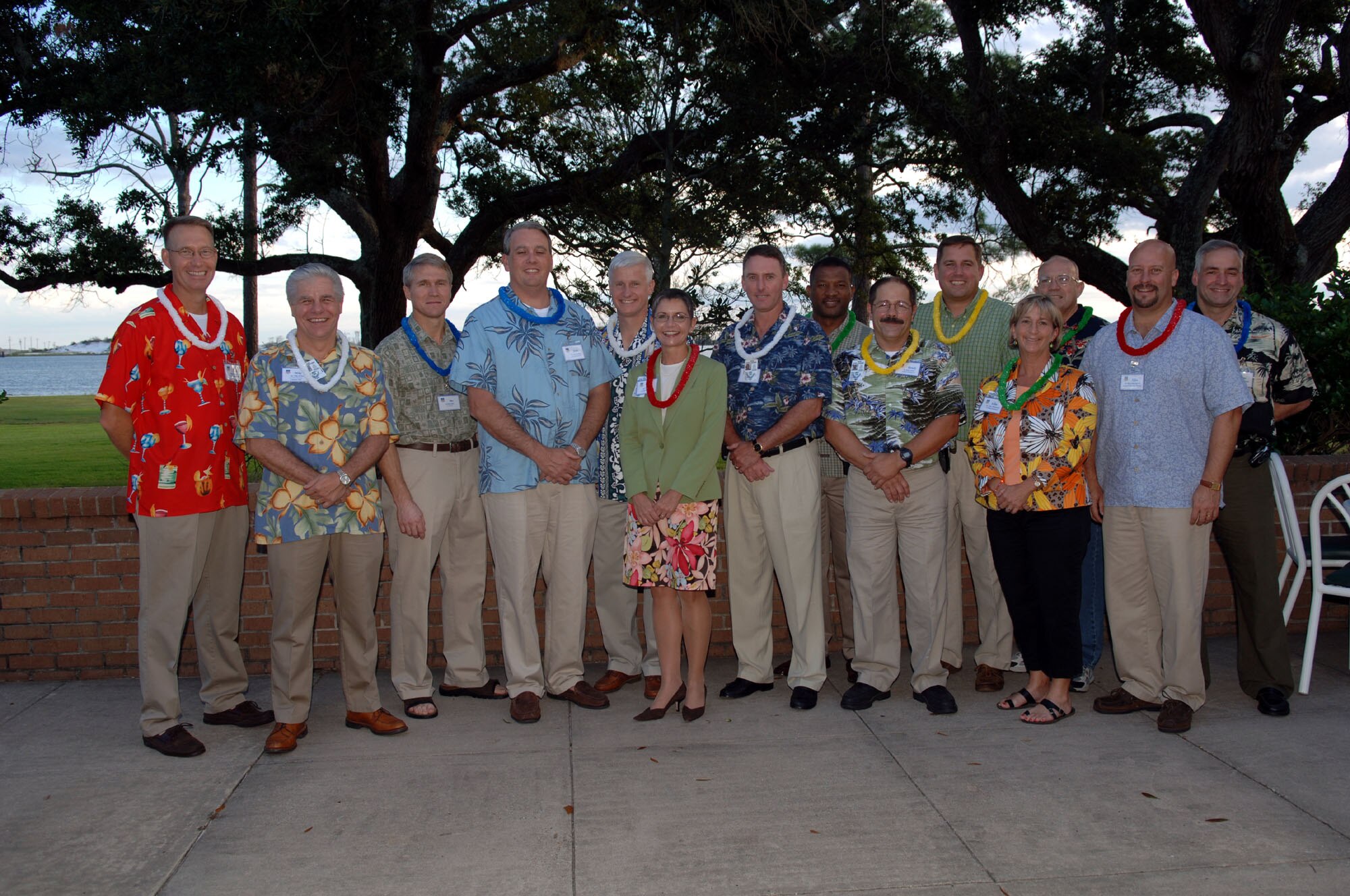 Honorary commanders enjoy a Hawaiian themed event with base leadership at The Soundside. (U.S. Air Force Photograph by Senior Airman Ali Flisek)