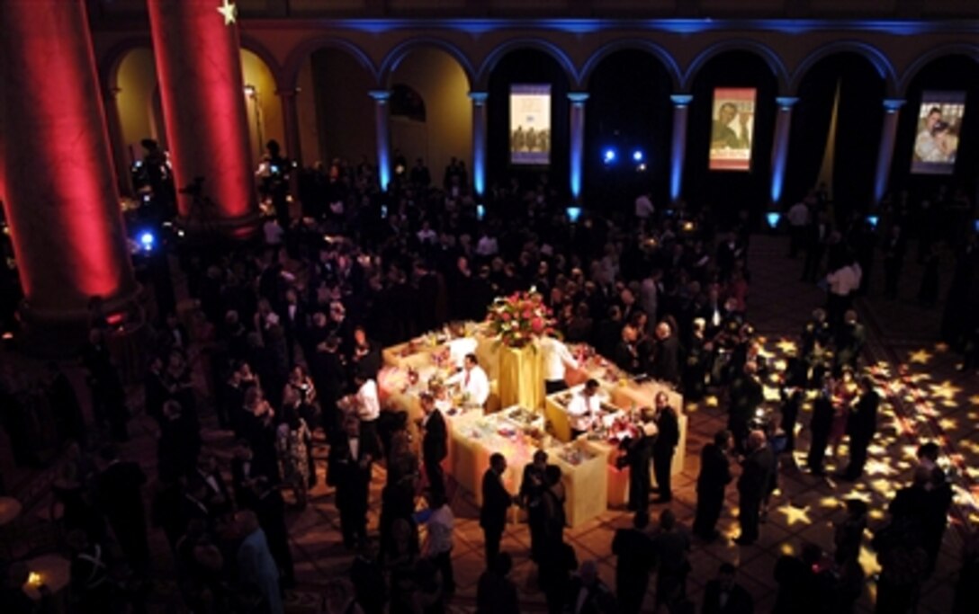 Guests and members of the United Service Organization gather at the beginning of the 65th Annual World Gala at the National Building in Washington, D.C., Sept. 28, 2006. The event paid tribute to servicemembers from each branch of the Armed Forces.