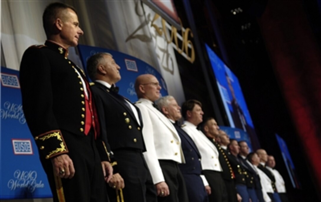 Chairman of the Joint Chiefs of Staff U.S. Marine Corps Gen. Peter Pace and other distinguished guests are introduced at the USO's 65th Annual World Gala in Washington, D.C., Sept 28, 2006. The event paid tribute to servicemembers from each branch of the Armed Forces. 