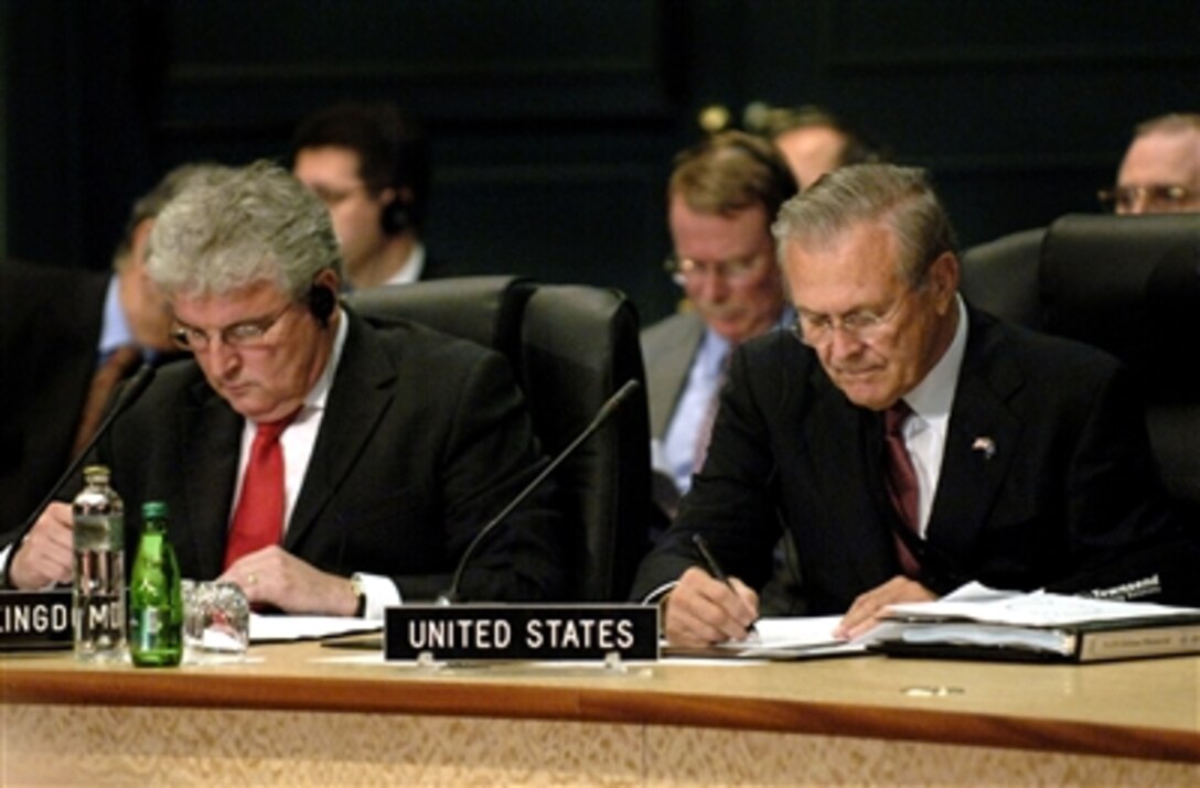 United Kingdom Minister of Defense Des Browne, left, and Defense Secretary Donald H. Rumsfeld attend a NATO-Russia Council meeting, at Portoroz, Slovenia, Sept. 29, 2006. Rumsfeld was in Slovenia to meet with Slovenian leaders and attend the NATO Defense Ministerial.