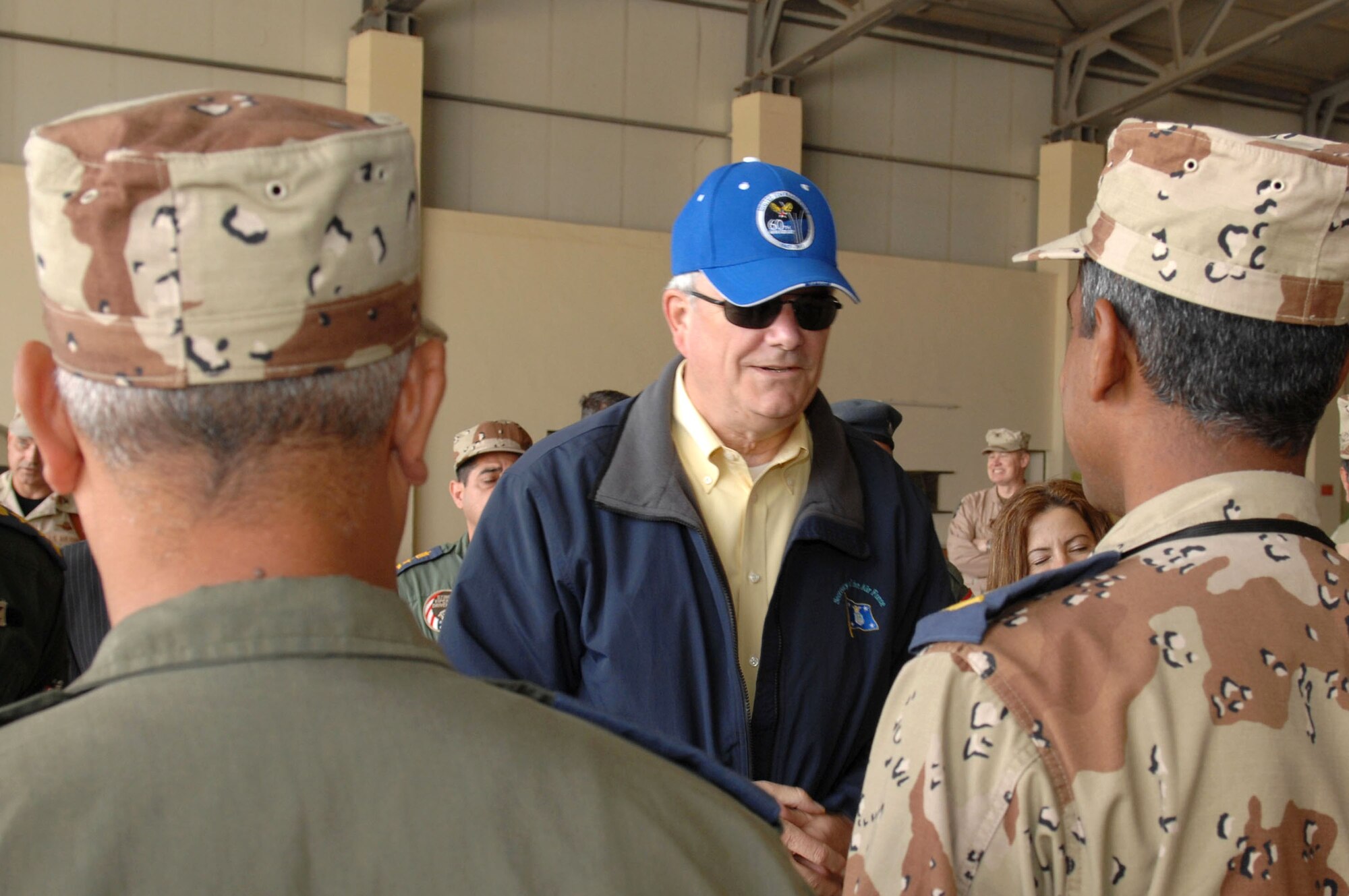 Secretary of the Air Force Michael W. Wynne visits with Squadron 3, Iraqi Air Force March 28 at Kirkuk Air Base in Iraq. (U.S. Air Force photo/Senior Airman Bradley A. Lail) 