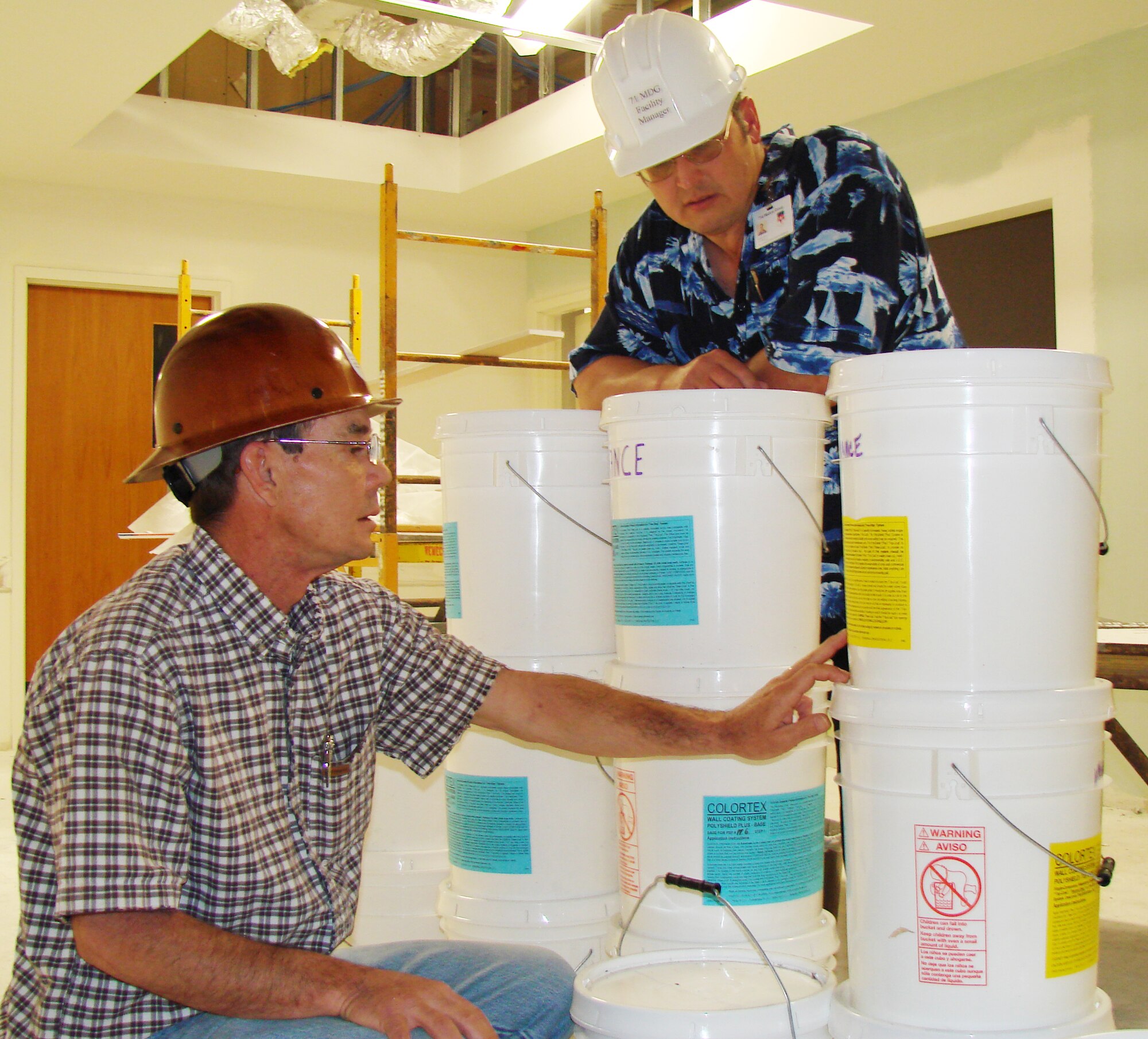 VANCE AIR FORCE BASE, Okla. -- Don Romine, Superintendent of Southwind, and Shane Campbell, clinic facility manager, discuss renovation plans at the clinic. (U.S. Air Force Photo/Jennifer Carroll)