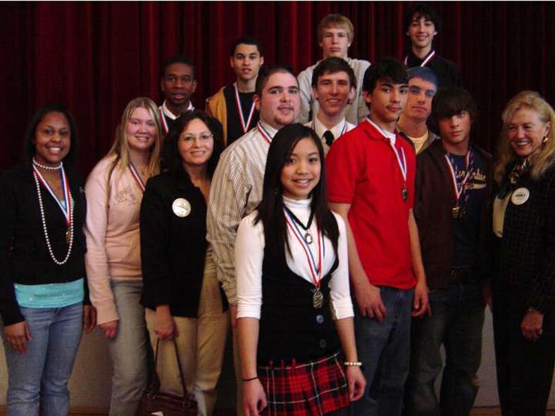 SPANGDAHLEM AIR BASE, GERMANY -- Bitburg High School students who were first place winners at the 2007 DoDDS-Europe National History Day Contest pose for a photo. Back row Zeth McNeal, Angelo Treherne, Jordan Thomas and Kyle Barton; middle row Emily Kroloff, Mary-Lynn Piper, Elder, Justin Heller, Aaron Roth, Matt Gohl, Kyle Barton and Diana Ohman, DoDDS-Europe director; and front row Emily Caoagas. (Courtesy photo)