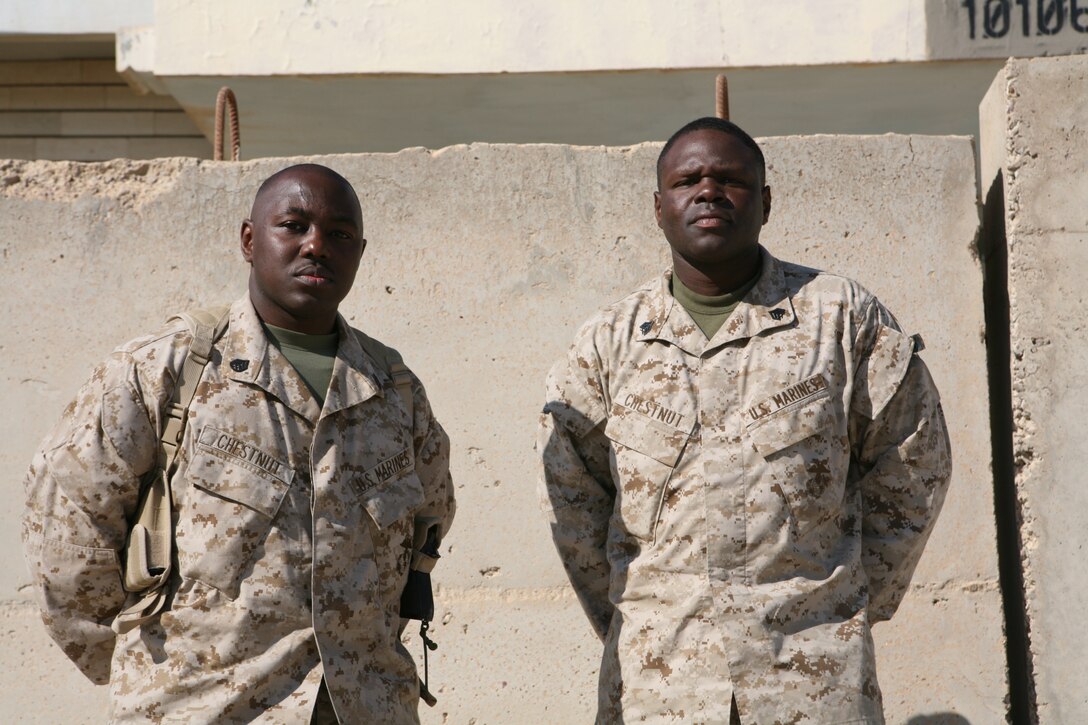 Staff Sgt. Kevin Chestnut, an information systems and computers/ tactical electronic reconnaissance process/evaluation system technician, and cousin Sgt. Russell Chestnut, a supply chief for 1st Battalion, 2nd Marines, 2nd Marine Division, April 3 are currently deployed here for the second time. Kevin and Russell are two of the nine active duty Marines in the family that are currently serving the Corps.