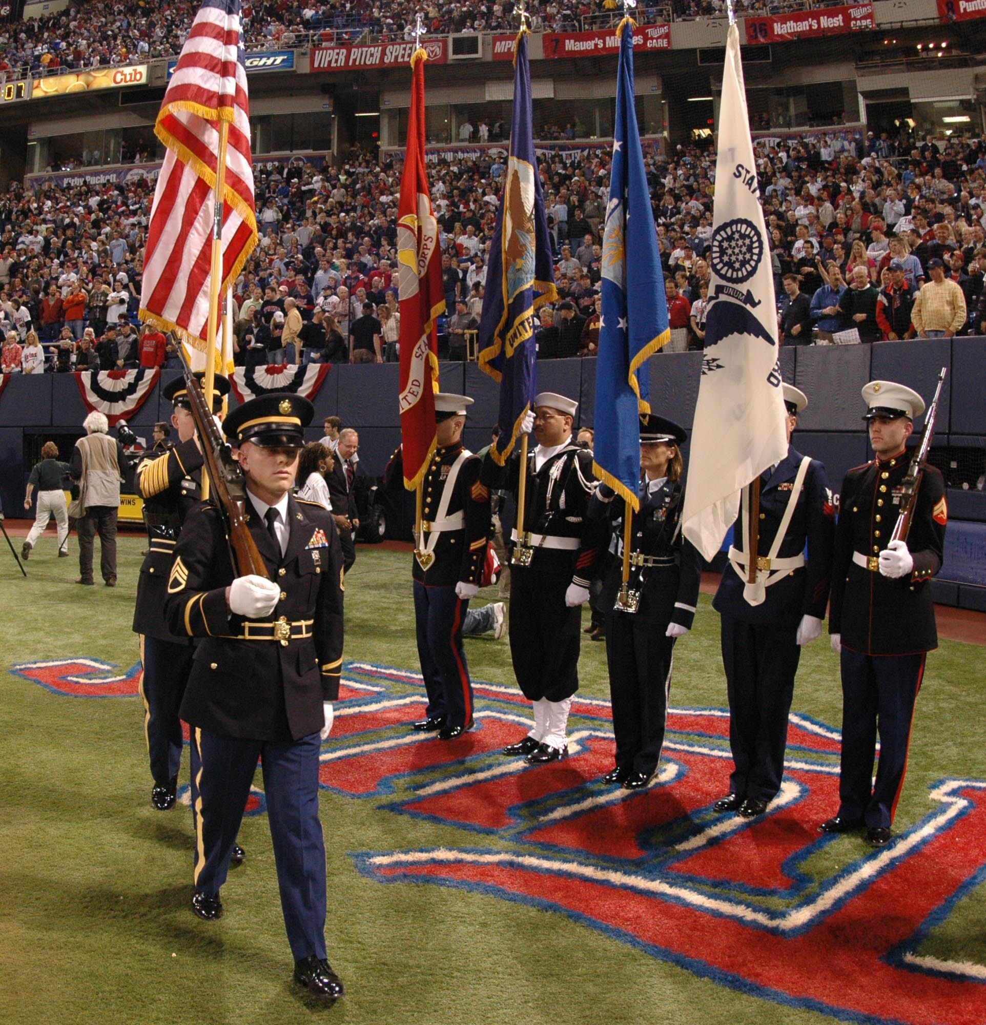 A Joint Service Color Guard from Minneapolis St. Paul Air Reserve Station presents the colors at the opening  day ceremonies for the Minnesota Twins April 2.  The Color Guard consisted of Reservists and active duty members from the Air Force, Army, Navy, Marines and Coast Guard.
Air Force Photo/Paul Zadach