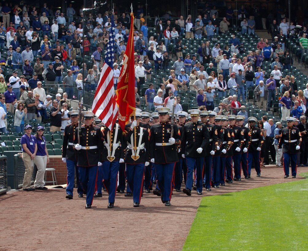 DENVER – More than 50 Marines from Buckley Air Force Base march in formation during the Colorado Rockies’ opening-day ceremonies at Coors Field April 2. The Rockies were defeated by the Arizona Diamondbacks 8 - 6. (U.S. Air Force photo by Senior Airman Alex Gochnour)
