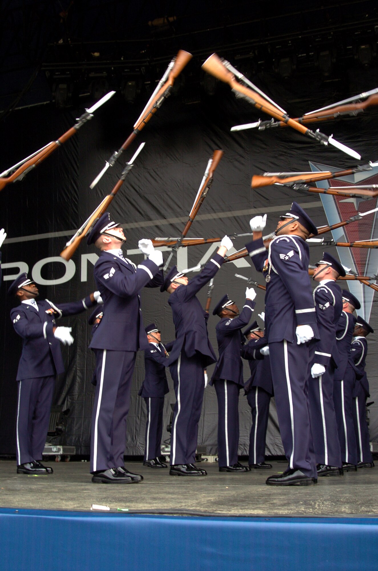 The U.S. Air Force Honor Guard Drill Team performs precision movements with M-1 rifles with fixed bayonets during their performance at the National Collegiate Athletic Association Final Four pep rally at Centennial Olympic Park March 31 in Atlanta. The NCAA featured the Air Force as part of its Final Four celebration to highlight the service of the men and women in uniform to the United States. (U.S. Air Force photo/Master Sgt. Stan Coleman)