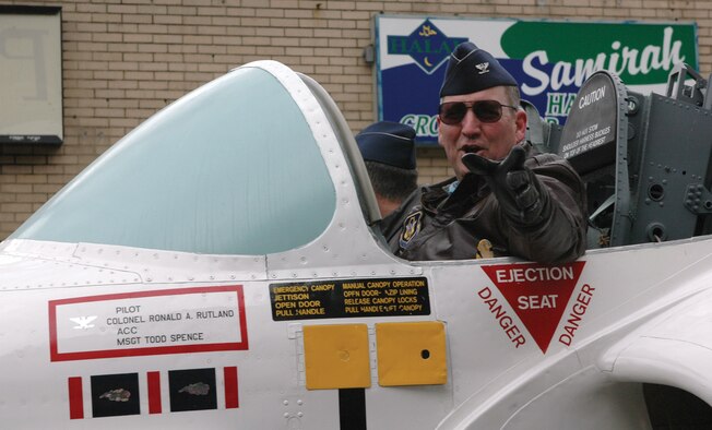 Col. Ronald A. Rutland, 512th Airlift Wing commander and co-pilot Col. Sam Cox, 436th AW commander represent Dover Air Force Base at the city's 14th Annual St. Patrick's Day Parade on March 17. The two rode in the Reserve wing's Liberty Belle, an actual T-37 which has modified parade wings. More than 1,200 people lined Loockerman St. despite frigid temperatures to see Irish-themed bands, groups and car clubs. The 512th AW is an Air Force Reserve Command unit. (U.S. Air Force photo/1st Lt. Marnee A.C. Losurdo)    