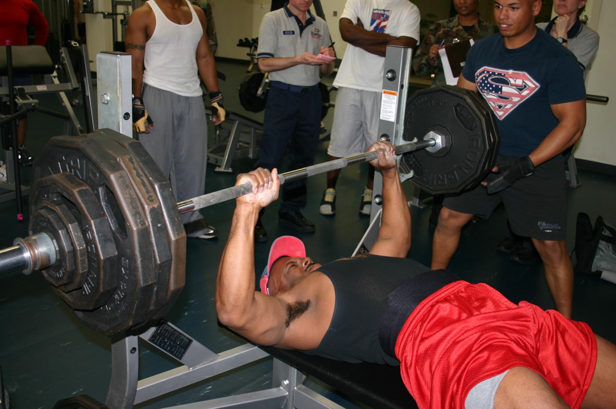 Master Sgt. Hodges Horton, 76th Air Refueling Squadron, attempts to bench press 380 pounds during the Sports Day weightlifting competition Wednesday at the fitness center. 

Overall Sports Day Champions with the highest cumulative scores:
1st Place – 305th Civil Engineer Squadron; 475 points
2nd Place – 305th Medical Group; 405 points 
3rd Place – 305th Logistics Readiness Squadron; 385 points 
4th Place – 305th Services Squadron; 350 points

Chiefs vs. Eagles Volleyball Game – Eagles Win!
Warrior Run — 24 squadrons represented; 450 participants