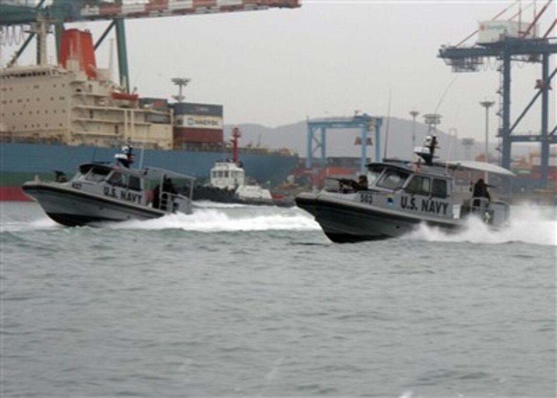 Units from Naval Coastal Warfare Squadron 33 conduct training operations in the port of Busan, South Korea, on March 27, 2007, during exercise Foal Eagle 2007.  The annual joint command post and field training exercise improves combat readiness and joint and combined interoperability.  