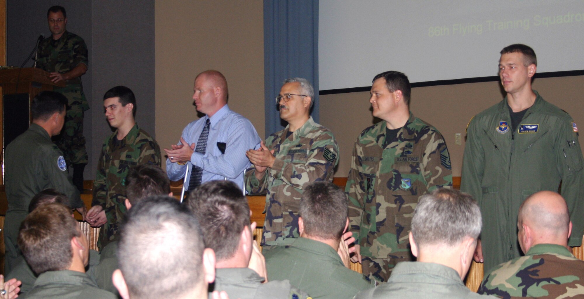 LAUGHLIN AIR FORCE BASE, Texas-- (Far left) Airman 1st Class Patrick Bigler, 4th communication Squadron, receives an IG coin from Col. Joseph Barron, Air Education and Training Command Inspector General, during Laughlin Operational Readiness Inspection out-brief Tuesday.
Other recipients of IG coins included Master Sgt. David Drotts, 47th Force Support Squadron; Bill Goins, 47th Aeromedical-Dental Squadron; Tech. Sgt. Alan Garcia, 47th Maintenance Directorate and Maj. Steve Kohut, 86th Flying Training Squadron.  (U.S. Air Force photo by Senior Airman Oufemi Owolabi)