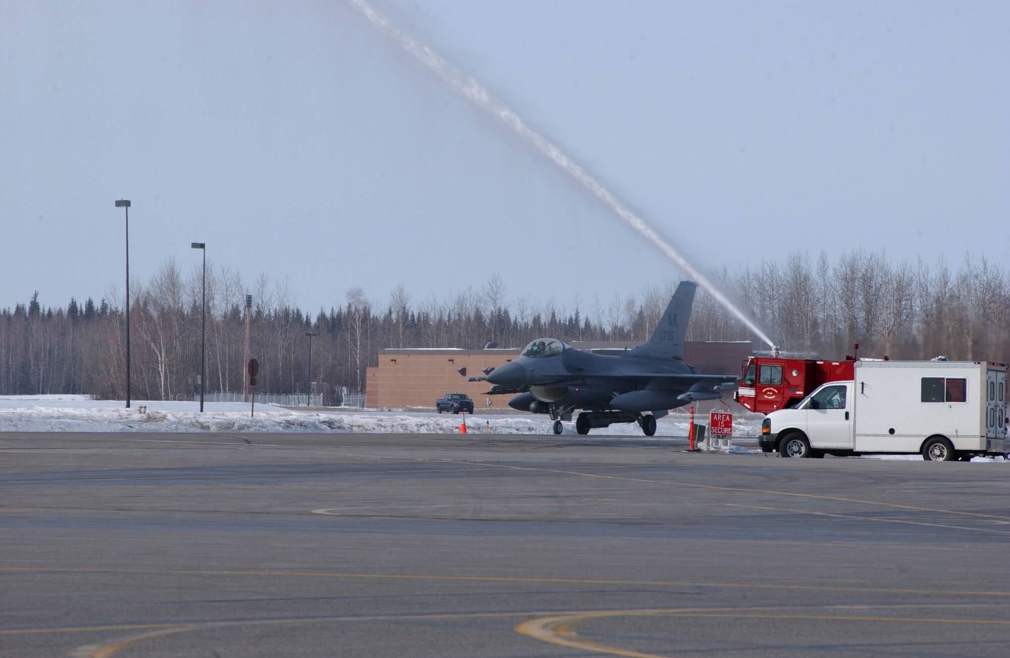 EIELSON AIR FORCE BASE, Alaska -- Col. James Horton, 354th Fighter Wing Vice Commander, taxis down the runway during his Fini Flight on April 3. Colonel Horton was Vice Commander from 2005-2007 and will be departing to Hickam AFB, Hawaii. (U.S. Air Force Photo by Airman 1st Class Jonathan Snyder)