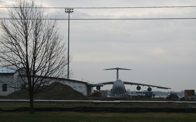 WRIGHT-PATTERSON AFB, Ohio - Construction progresses as the 445th Airlift Wing continues their conversion to the C-5 Galaxy March 23, 2007.  The wing’s new C-5 Squadron Operations Facility (shown left) will support squadron operations.  This includes aircrew, life support (maintains aircrew survival equipment), training and office space.  The facility is schedule for completion July 2007. (U.S. Air Force Photo/Laura Darden)