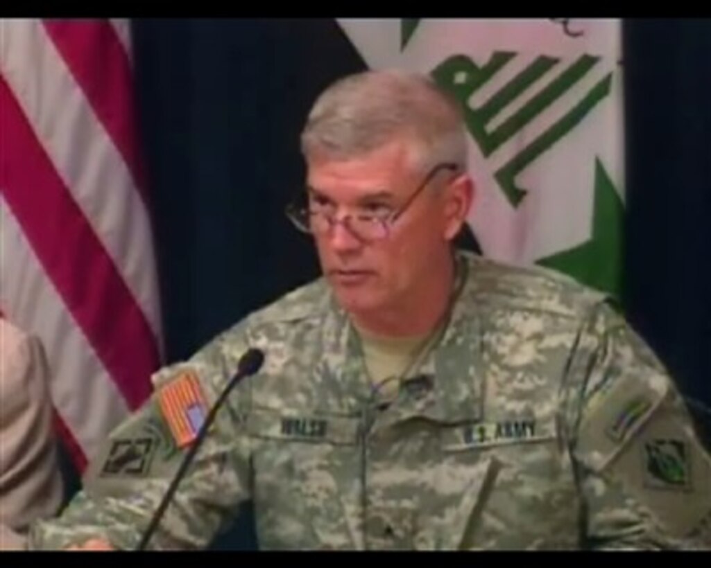 Commanding General of the Gulf Region Army Corps of Engineers Brig Gen. Michael Walsh  speaks with reporters in Iraq, April 4, 2007.