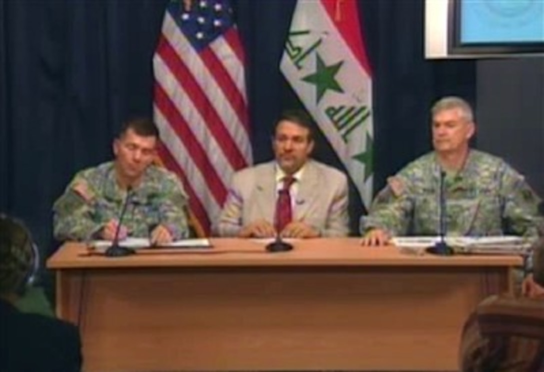 Multi-National Force-Iraq spokesperson Maj. Gen.  William Caldwell, Government of Iraq Spokesman Dr. Aldabbaugh and Commanding General of the Gulf Region Army Corps of Engineers Brig. Gen. Michael Walsh speak with reporters in Iraq, April 4, 2007. 