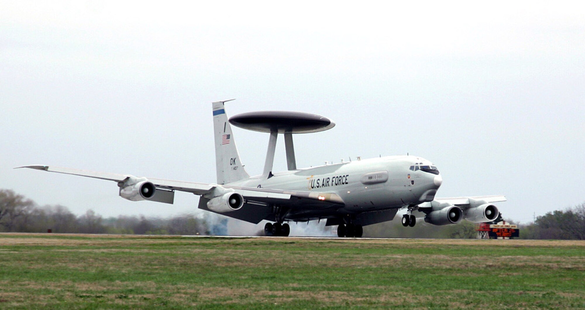 An E-3 Sentry airborne warning and control system aircraft, known as AWACS, lands at Tinker Air Force Base, Okla., March 23 after completing a mission.  The first E-3 touched down at Tinker exactly 30 years to the day and began an new era for air surveillance.  (U.S. Air Force photo/Staff Sgt. Stacy Fowler)