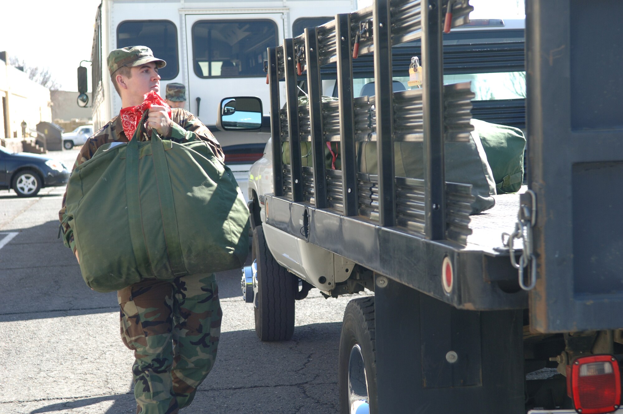 FAIRCHILD AIR FORCE BASE, Wash. - Airman 1st Class Thomas J. Cornell of the 92nd Logistics Readiness Squadron here loads mobility bags during an exercise recently. Airman Cornell works as a special purpose vehicle and equipment repair apprentice, but augmented as a vehicle operator during the exercise. (U.S. Air Force photo/Airman 1st Class Jocelyn A. Ford)