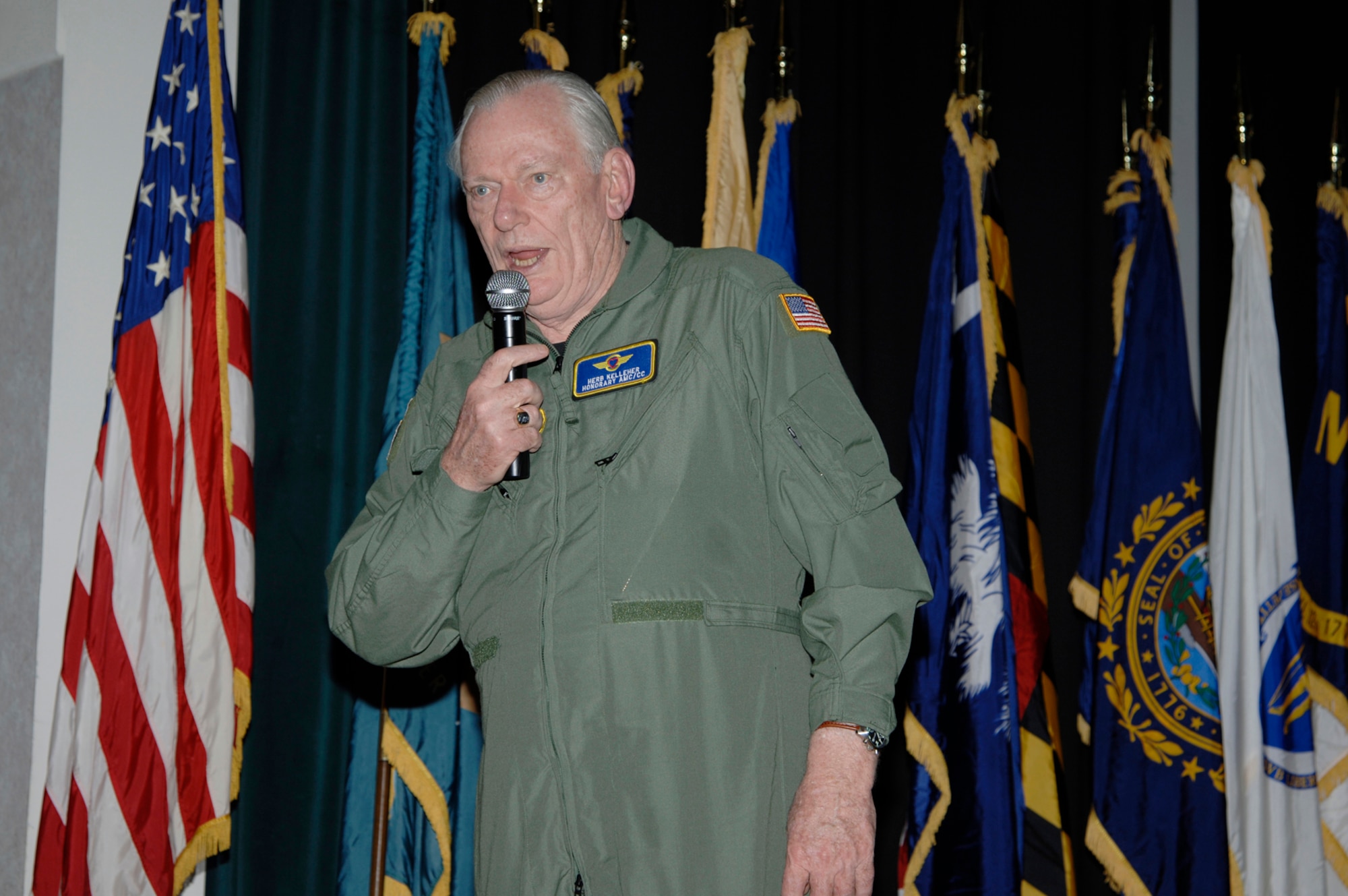 Herb Kelleher, a founder and Executive Officer for Southwest Airlines, address Team McConnell April 4 at the Dole Center.  Mr. Kelleher, who was chosen as the Air Mobility Command honorary commander, and General Duncan J. McNabb, AMC commander, visited McConnell Air Force Base April 4-5.  (Air Force photo taken by Senior Airman Jamie Train, 22nd Communications Squadron)  
