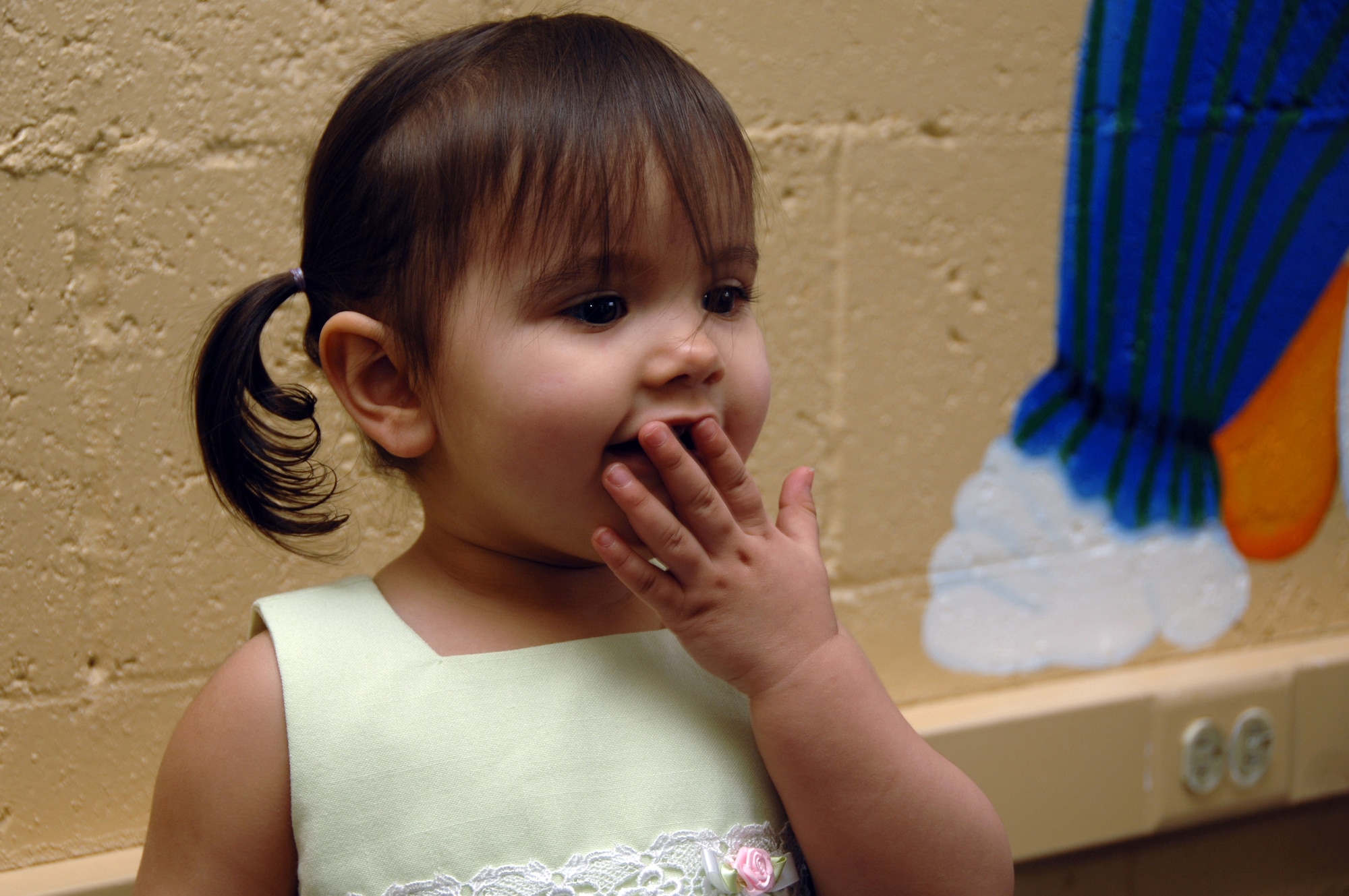 EIELSON AIR FORCE BASE, Alaska -- Adriana Strang, daughter of Claudia and Staff Sgt Joshua Strang, gasps at seeing the Easter Bunny during the preschool Easter party at the community center here April 5. The event consisted of games, snacks, and an Easter Egg hunt for base children.
(U.S. Air Force Photo by Staff Sgt Joshua Strang)