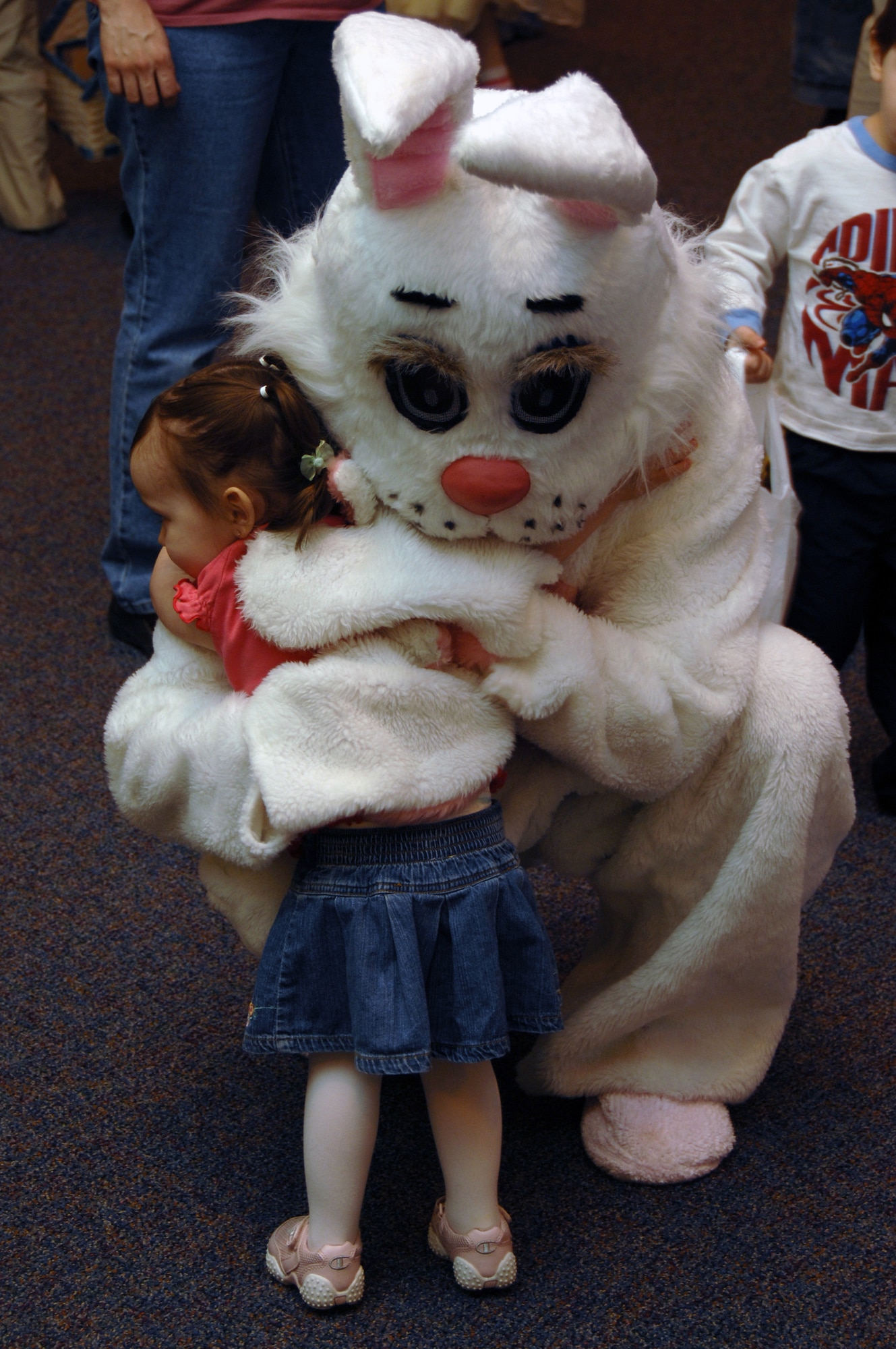 EIELSON AIR FORCE BASE, Alaska -- Miracle Brown, daughter of Renee and Staff Sgt Jeshua Brown, hugs the Easter Bunny during the preschool Easter party at the community center here April 5. The event consisted of games, snacks, and an Easter Egg hunt for base children.
(U.S. Air Force Photo by Staff Sgt Joshua Strang)