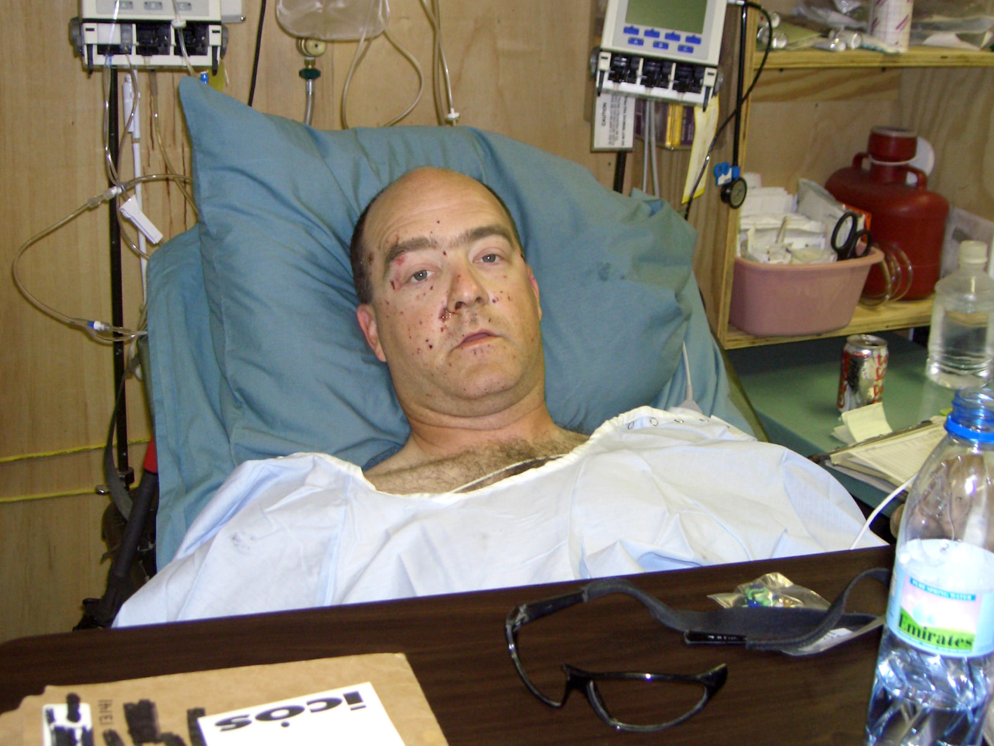 Maj. Mathew Conlan awaits evacuation from Bagram Air Base, Afghanistan, to Landstuhl Regional Medical Center in Germany the morning after being injured by a landmine blast.  Major Conlan then was flown to Wilford Hall Medical Center at Lackland Air Force Base, Texas, for further treatment. (Courtesy photo) 