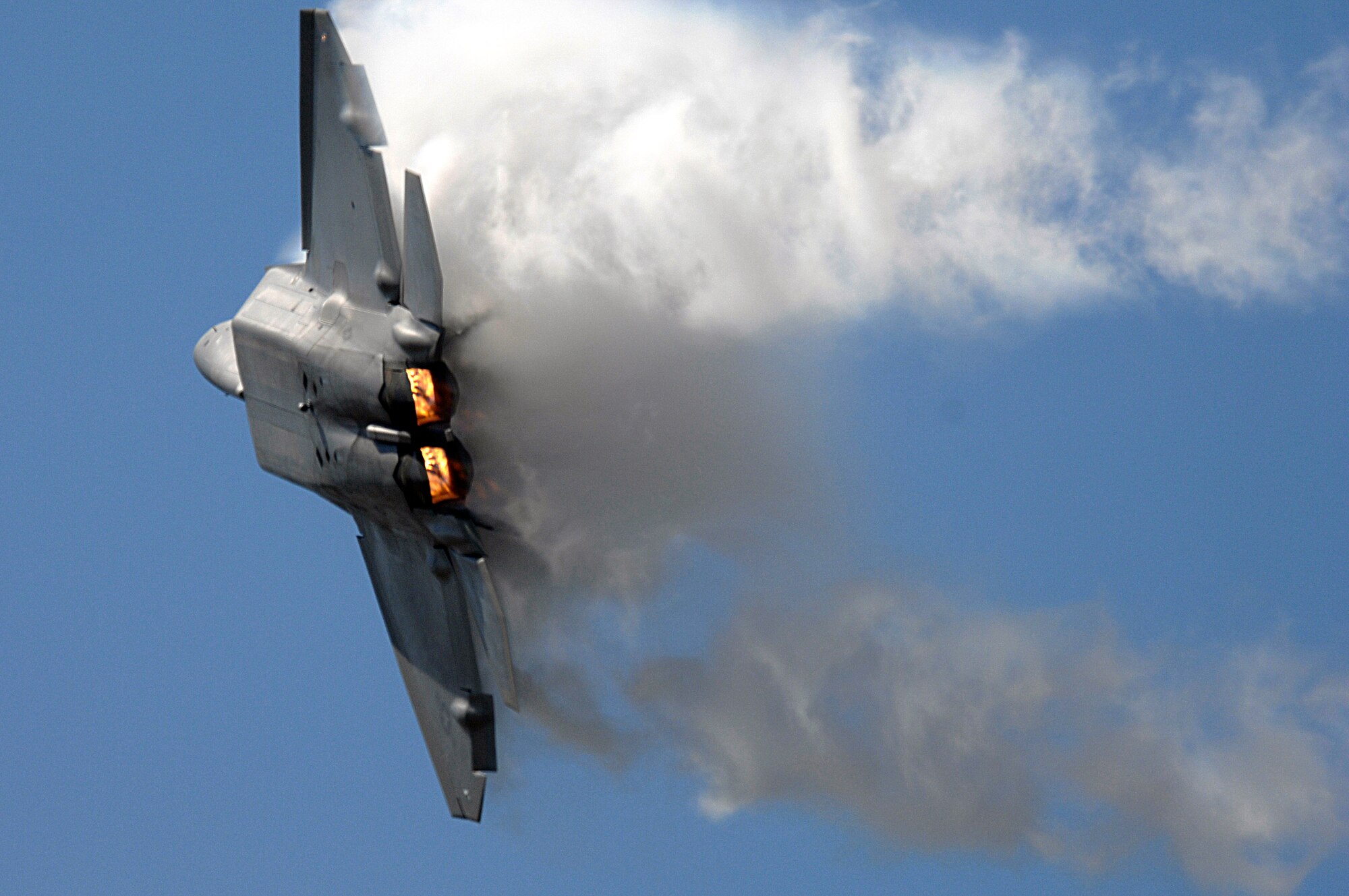 An F-22 Raptor performs for thousands during an April 1 air show at Naval Base Ventura County in Point Mugu, Calif.  The F-22's aero design, advanced flight controls, thrust vectoring and high thrust-to-weight ratio allows it to outmaneuver its adversaries. (U.S. Air Force photo/Tech. Sgt. Justin D. Pyle)