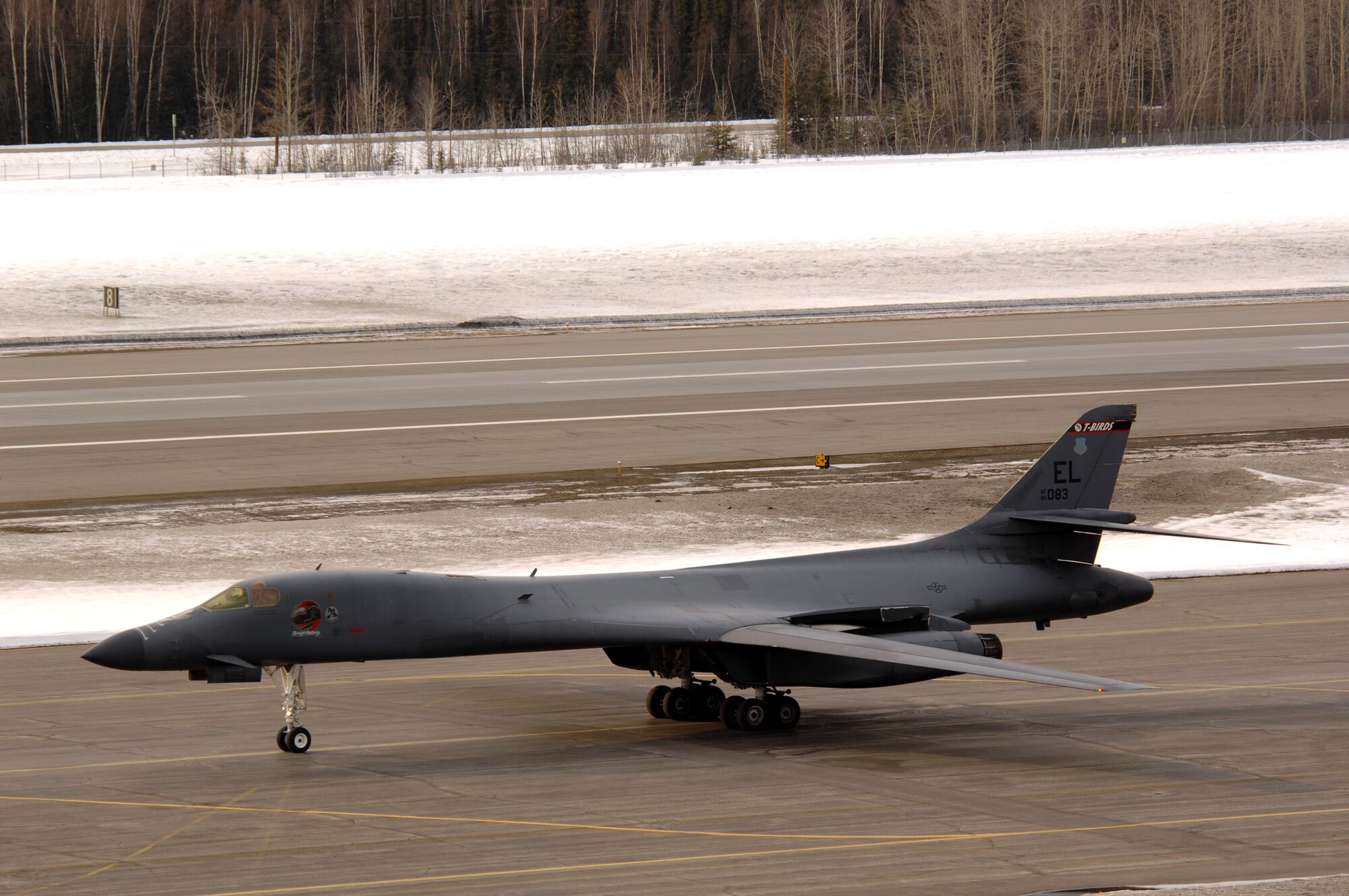 A B-1B Lancer from Ellsworth Air Force Base, S.D., performs a touch and go before landing for Red Flag-Alaska 07-1 April 3 at Eielson Air Force Base, Alaska. More than 1,300 military members from the United States, France and Australia have gathered here to participate in Red Flag-Alaska 07-1 scheduled April 5 to 21. (U.S. Air Force photo/Staff Sgt. Joshua Strang) 

