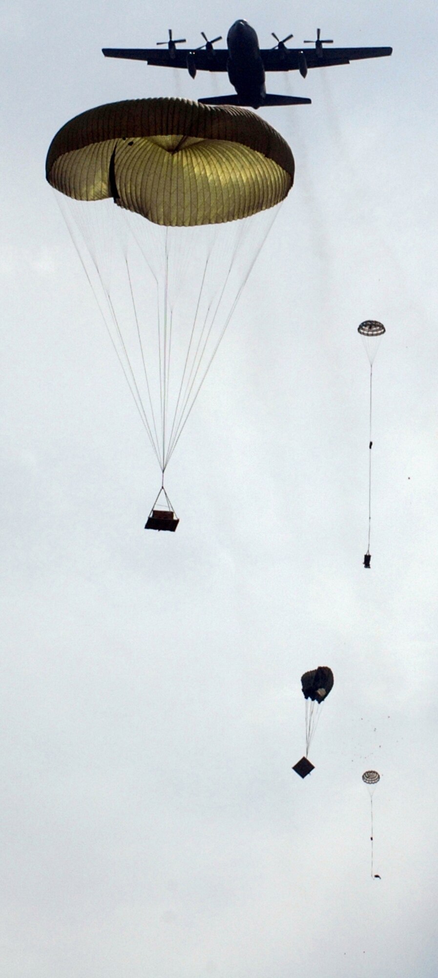 An Air Force Reserve Command C-130 cargo aircraft belonging to the Maxwell AFB, Ala.-based 908th Airlift Wing completes an airdrop training mission over a drop zone about 25 miles northwest of the base. Aircrew and aerial port personnel routinely practice airdrops and recovery of training equipment and supplies to maintain proficiency. (U.S. Air Force photo by Mr. Jeff Melvin)