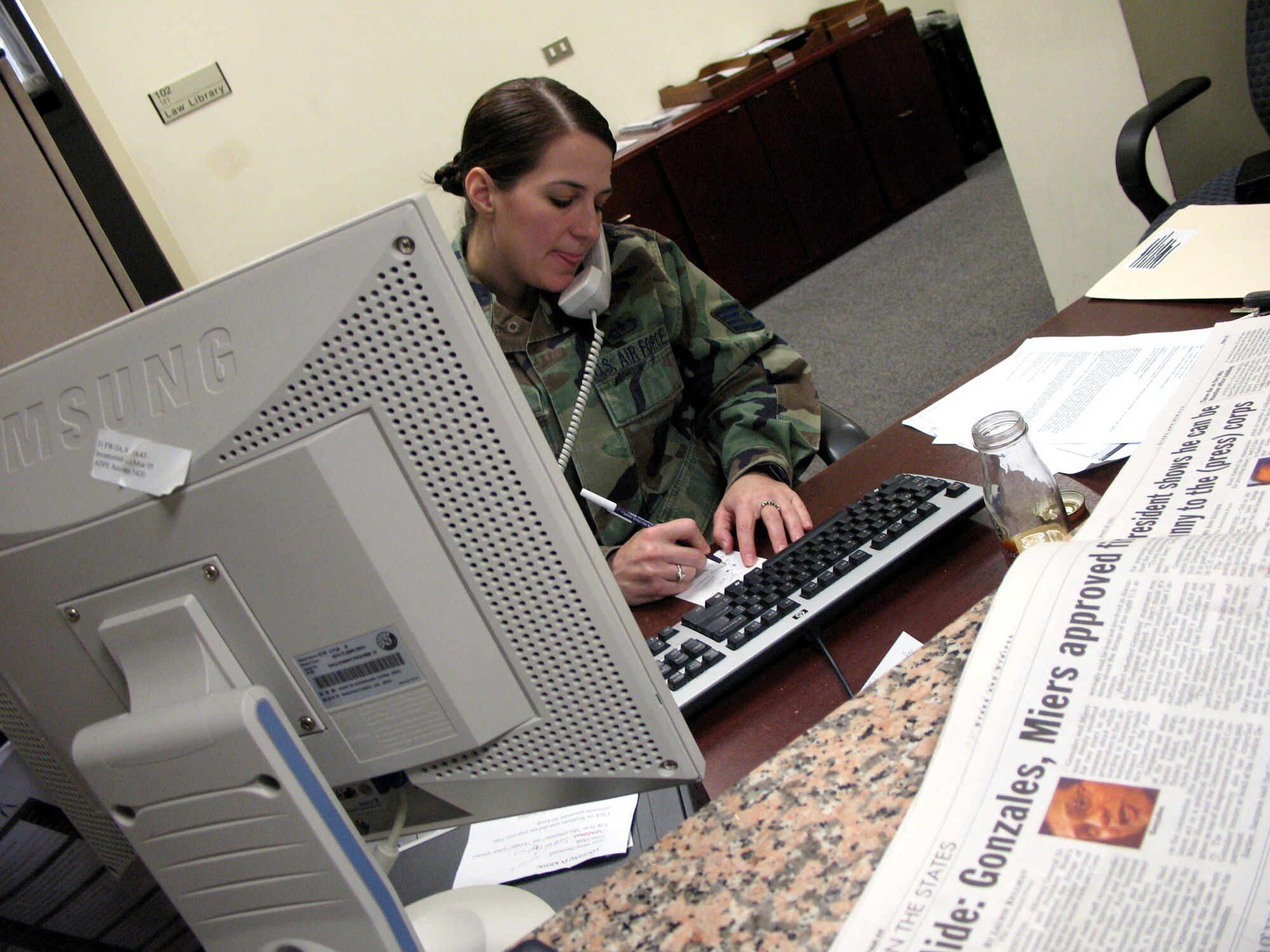 Staff Sgt. Tobi Erskine gives a caller information about the new claims process April 4. In the past base legal offices handled all moving claims, and now the new claims Web site is expected to decrease that number drastically. (U.S. Air Force photo/Airman 1st Class Justin Goodrich)