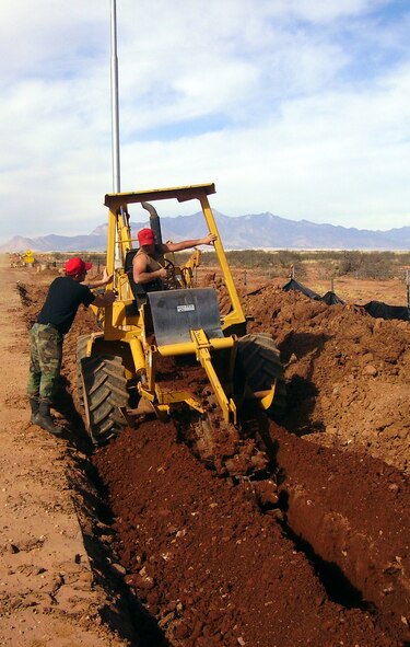 New trenches were dug to place upgraded cable to support the light pole installation along the 1.7 kilometer stretch of roadway the 36-member 819th RED HORSE Squadron team repaired in Naco, Ariz. 