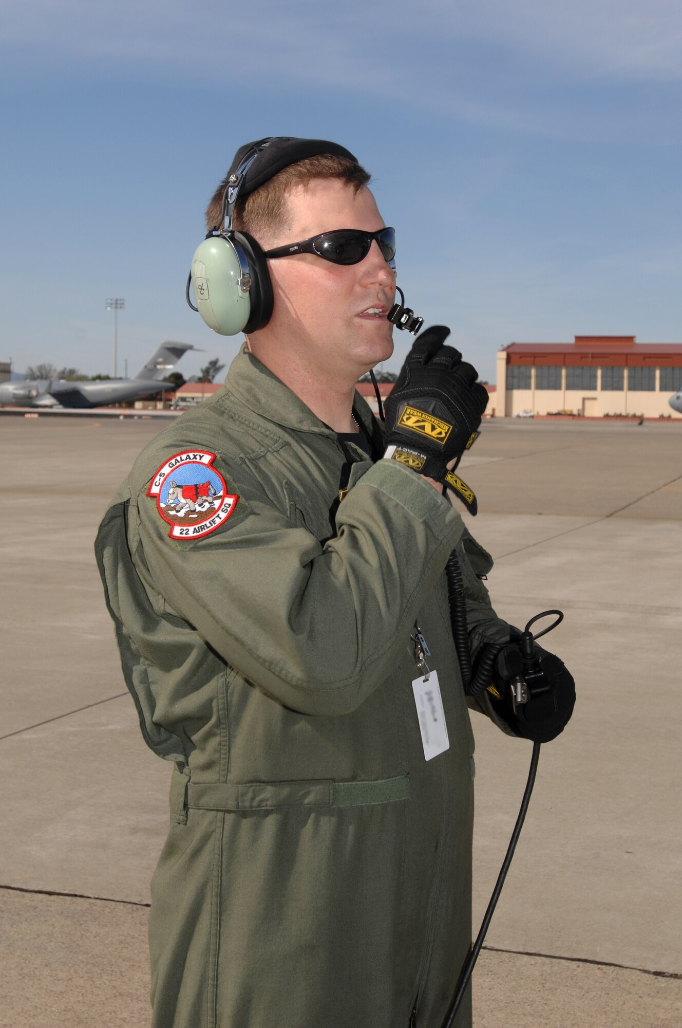 Staff Sgt. Jeff Gorrell, 22nd Airlift Squadron C-5 flight engineer, verifies flight control movement during a pre-flight check during the Crisis Look 07-02 deployment exercise held on Travis Air Force Base, Calif. (U. S. Air Force photo by Nan Wylie)