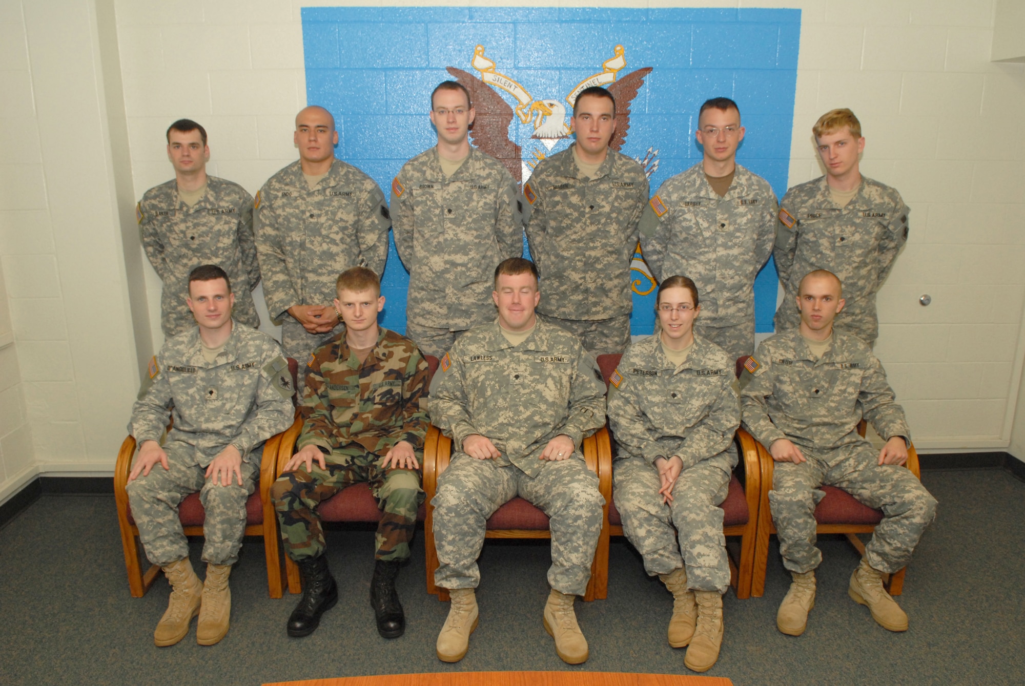 Eleven student Soldiers from the first-ever Iraqi Dialect Course pose for a group photo after a graduation ceremony at the 344th Military Intelligence Battalion. Pictured are (front row from left to right): Specialists Michael D'Angiollilo, Jason Andersen, Jason Lawless, Kady Peterson, Nathan Sweem, (back row from left to right) Bradly Baker, Alexander Endo, Douglas Brown, Joshua Nissen, Kyle Draisey and Paul Price.

The eight-week-long course began Feb. 5. The next course begins on May 7. According to 344 MIBn personnel, the Iraqi Dialect Course will enable linguist Soldiers to provide much-improved signal intelligence support to Army and joint commanders in support of Operation Iraqi Freedom. (U.S. Air Force photo by Tech. Sgt. Randy Mallard)

