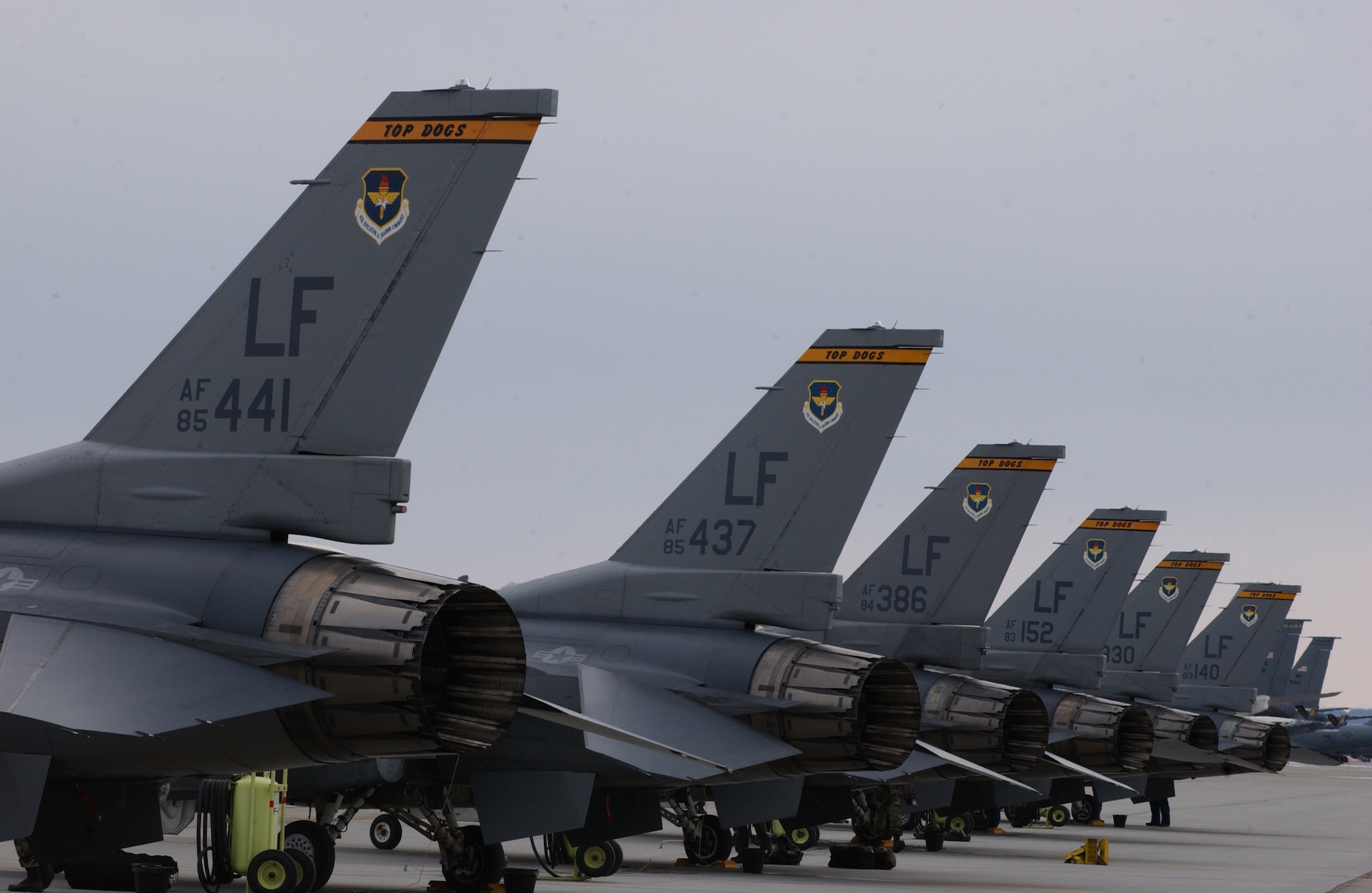 EIELSON AIR FORCE BASE, Alaska -- Eight F-16 Fighting Falcons from the 61st Fighter Squadron, Luke AFB, sit in front of the Thunderdome on April 3 for Red Flag-Alaska 07-1. Red Flag-Alaska is a Pacific Air Forces-directed field training exercise for U.S. forces flown under simulated air combat conditions.  It is conducted on the Pacific Alaskan Range Complex with air operations flown out of Eielson and Elmendorf Air Force Bases. (U.S. Air Force Photo by Airman 1st Class Jonathan Snyder) (Released)