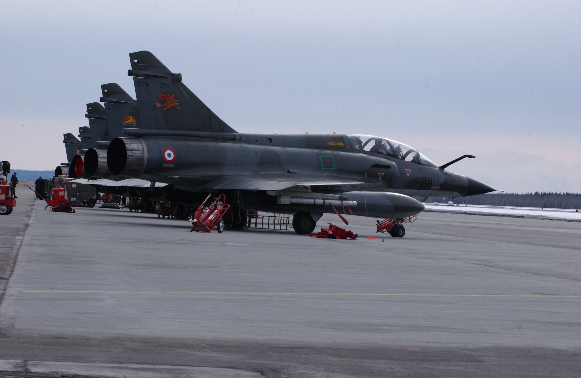 EIELSON AIR FORCE BASE, Alaska -- The French Air Force, Armee de l'Air, Dassault Mirage 2000 sits in front of the Thunderdome on April 3 for Red Flag-Alaska 07-1. Red Flag-Alaska is a Pacific Air Forces-directed field training exercise for U.S. forces flown under simulated air combat conditions.  It is conducted on the Pacific Alaskan Range Complex with air operations flown out of Eielson and Elmendorf Air Force Bases. (U.S. Air Force Photo by Airman 1st Class Jonathan Snyder) (Released)