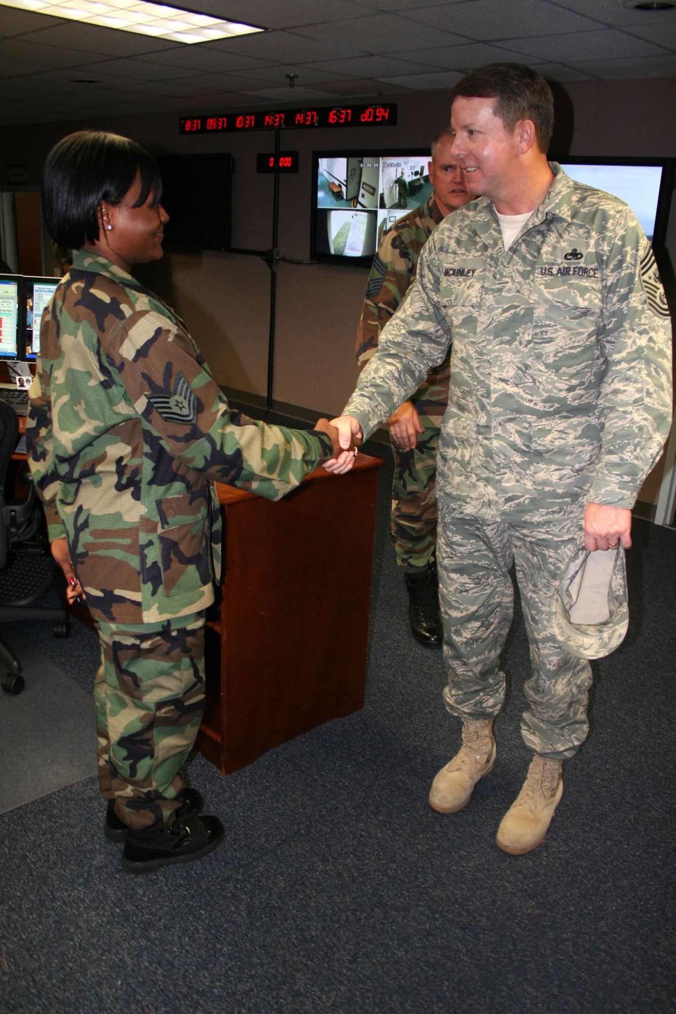 Chief Master Sgt. of the Air Force Rodney J. McKinley shakes hands with Tech. Sgt. Ishasia Love-Murphy April 4 at Lajes Field, Azores. Chief McKinley kicked off his tour of U.S. Air Forces in Europe installations with a two-day visit to Lajes Field April 4 and 5. Sergeant Love-Murphy is a command post controller. (U.S. Air Force photo/Staff Sgt. Marcus McDonald) 