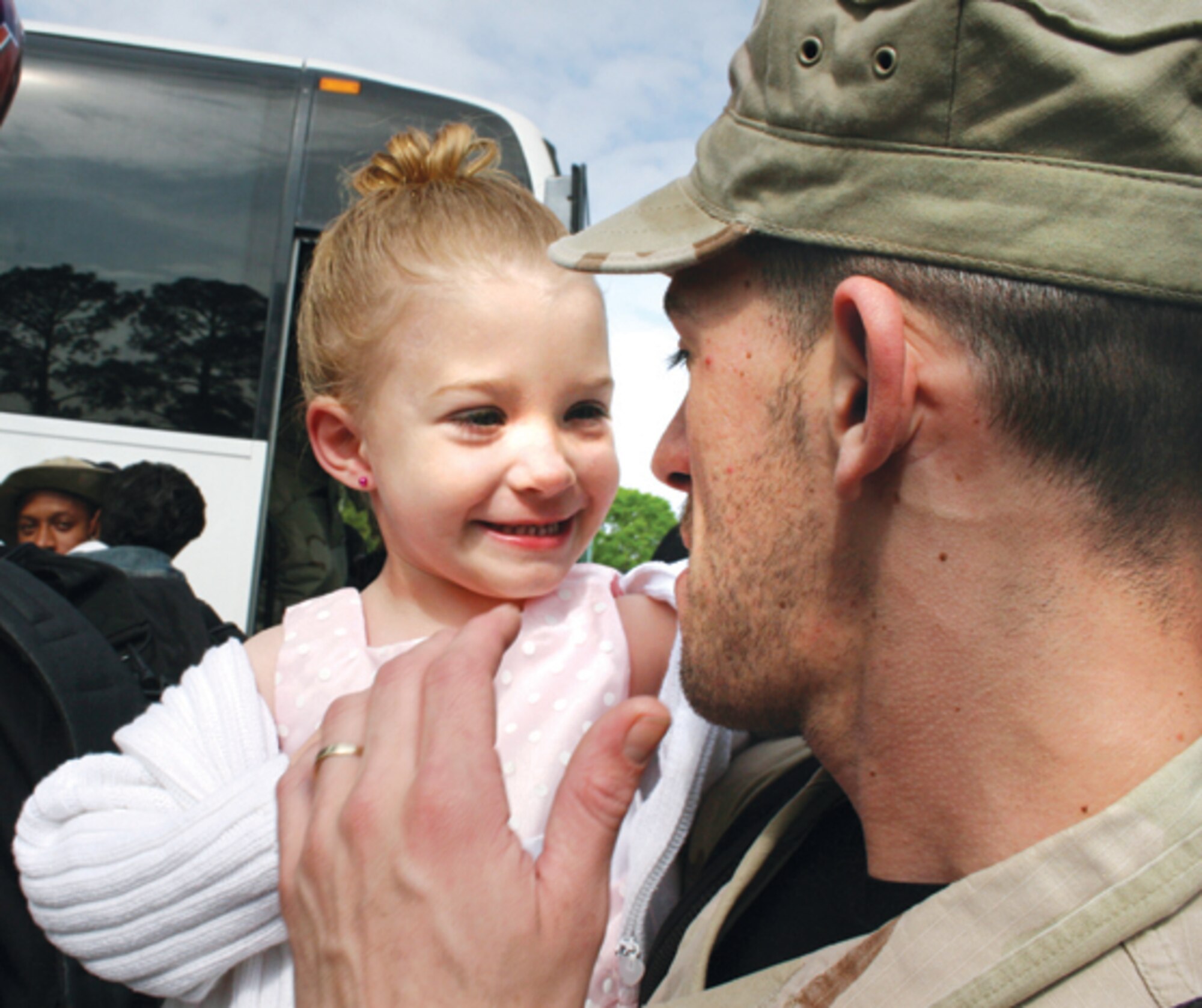Senior Airman Craig White, 78th Security Forces Squadron, greets his daughter Alexis, 3. (U.S. Air Force photo by Amanda Creel)