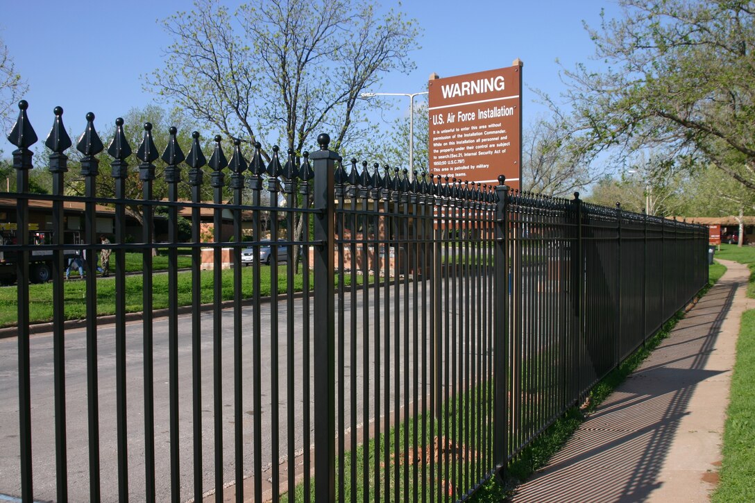The fencing erected by GMH Military Housing will enclose the housing area and extend to the existing guard shack. (U.S. Air Force photo/Staff Sgt. Tonnette Thompson)