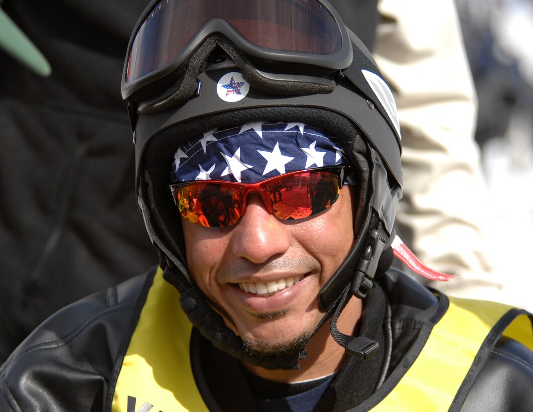 U.S. Army Pfc. Orlando Perez smiles for a photo after a downhill ski ride during the National Disabled Veterans Winter Sports Clinic in Snowmass, Colo., April 2, 2007.