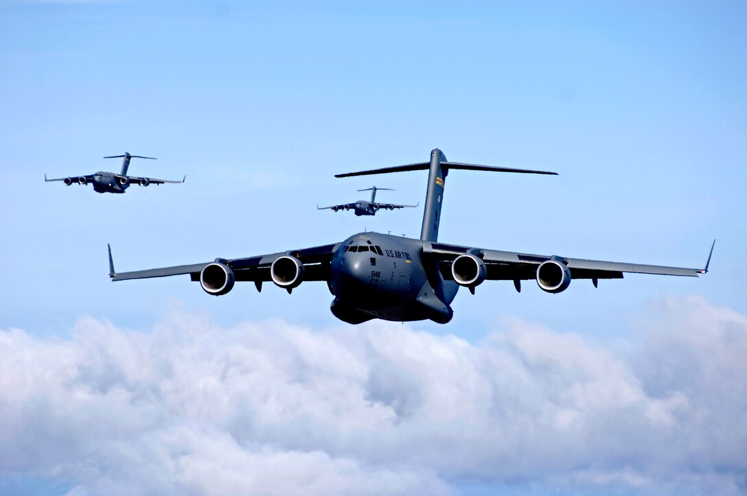U.S. Air Force C-17s like these provided intra-theater heavy airlift support, helping to sustain operations throughout Afghanistan, Iraq and the Horn of Africa. (U.S. Air Force photo/Tech. Sgt. Shane A. Cuomo) 