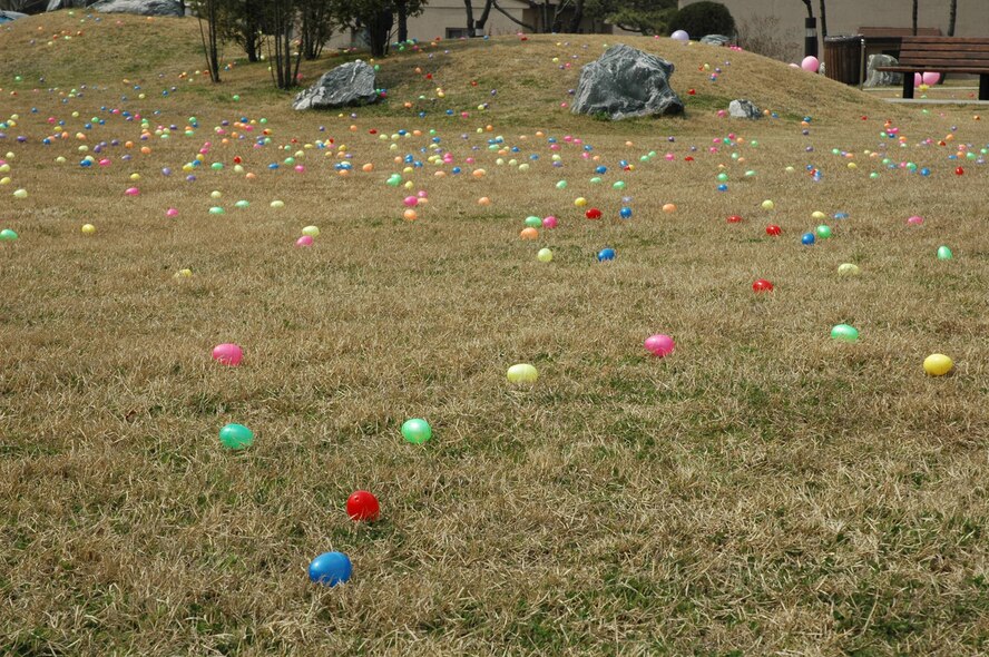 OSAN AIR BASE, Republic of Korea --  Plastic eggs are laid out for children to pick up in Turumi Park here Saturday. The 51st Services Squadron hosted the egg hunt, which gave children up to 12 years old the chance to find eggs to trade for candy. (U.S. Air Force photo by Staff Sgt. Benjamin Rojek)