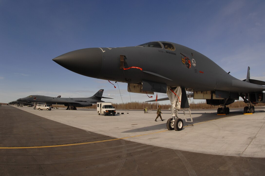 EIELSON AIR FORCE BASE, Alaska -- B-1B Lancers from Ellsworth Air Force Base, South Dakota, sit on the flightline here on Apr 9 during Red Flag-Alaska 07-1. Red Flag-Alaska enables aviation units to sharpen their combat skills by flying ten simulated combat sorties in a realistic threat environment. Additionally, the training allows them to exchange tactics, techniques, and procedures and improve interoperability.
(U.S. Air Force Photo by Staff Sgt Joshua Strang)