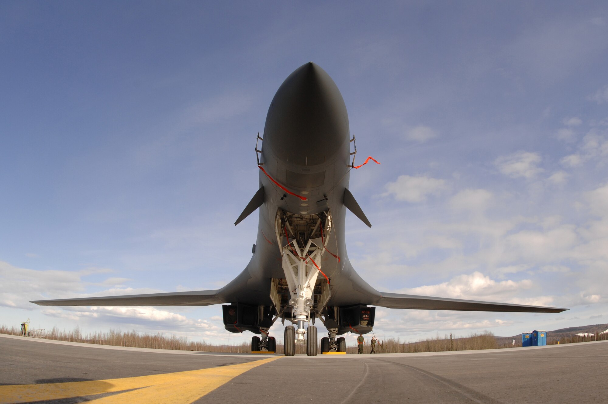 EIELSON AIR FORCE BASE, Alaska -- A B-1B Lancer from Ellsworth Air Force Base, South Dakota, sit on the flightline here on Apr 9 during Red Flag-Alaska 07-1. Red Flag-Alaska enables aviation units to sharpen their combat skills by flying ten simulated combat sorties in a realistic threat environment. Additionally, the training allows them to exchange tactics, techniques, and procedures and improve interoperability.
(U.S. Air Force Photo by Staff Sgt Joshua Strang)