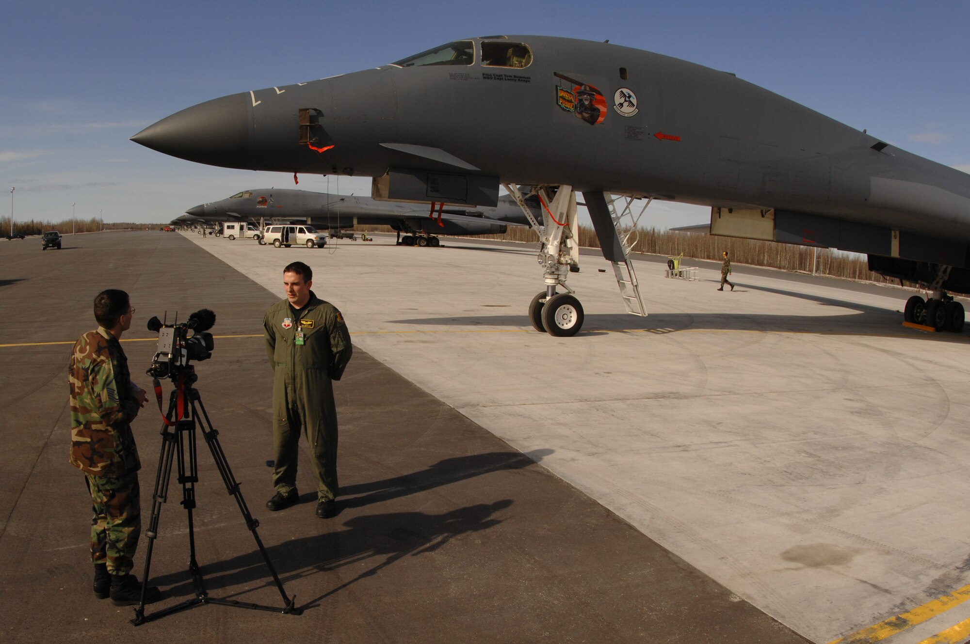 EIELSON AIR FORCE BASE, Alaska -- Capt Timothy Griffith, 37 Bomb Squadron, Ellsworth Air Force Base, South Dakota, is interviewed for a feature story by Master Sgt Rob Wieland, 354 Communications Squadron, Eielson Air Force Base, Alaska here on Apr 9 during Red Flag-Alaska 07-1. Red Flag-Alaska enables aviation units to sharpen their combat skills by flying ten simulated combat sorties in a realistic threat environment. Additionally, the training allows them to exchange tactics, techniques, and procedures and improve interoperability.
(U.S. Air Force Photo by Staff Sgt Joshua Strang)